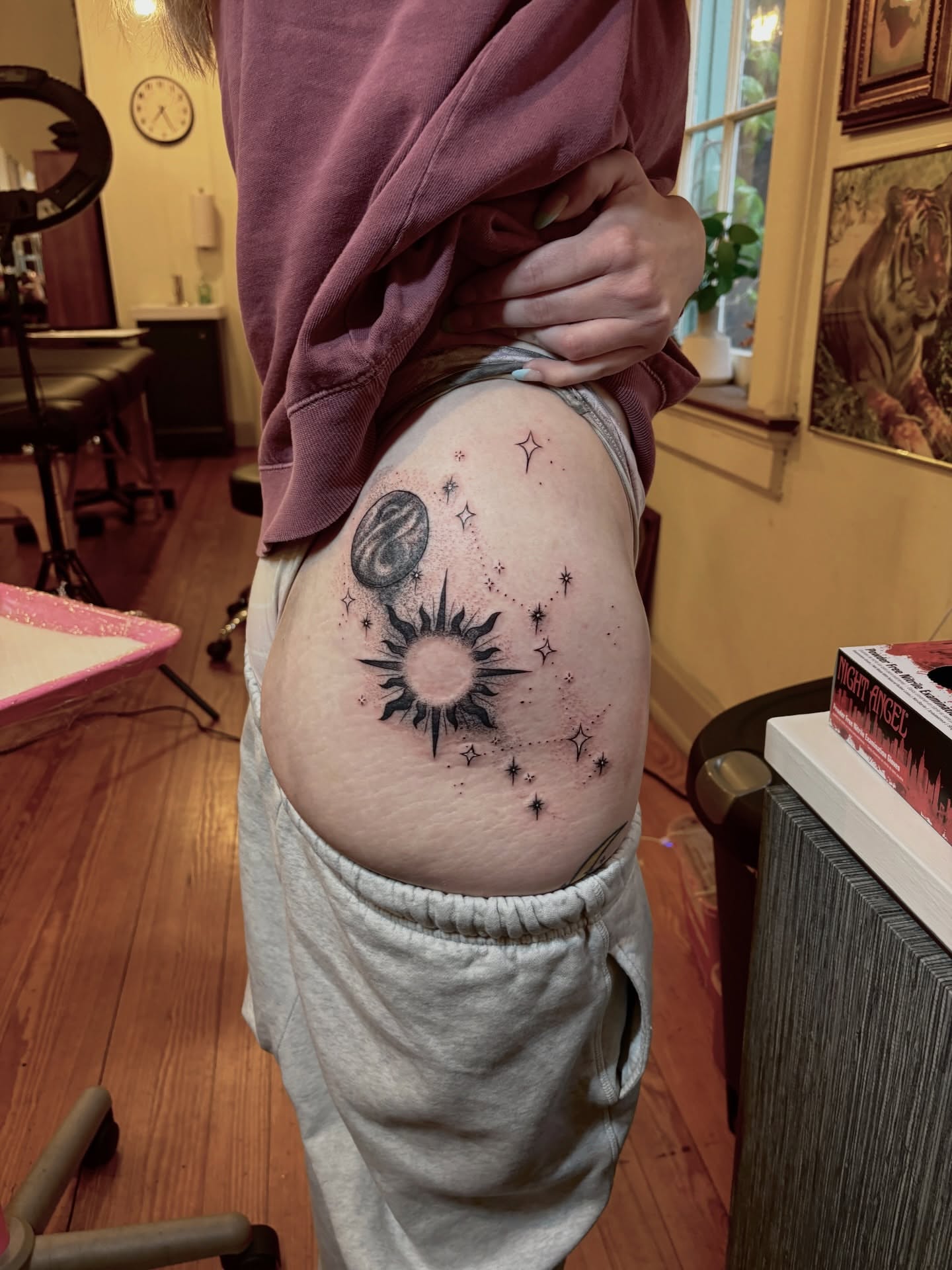 Sun and stars black and grey tattoo on the thigh by V ☆ Cincinnati Tattoo Artist
