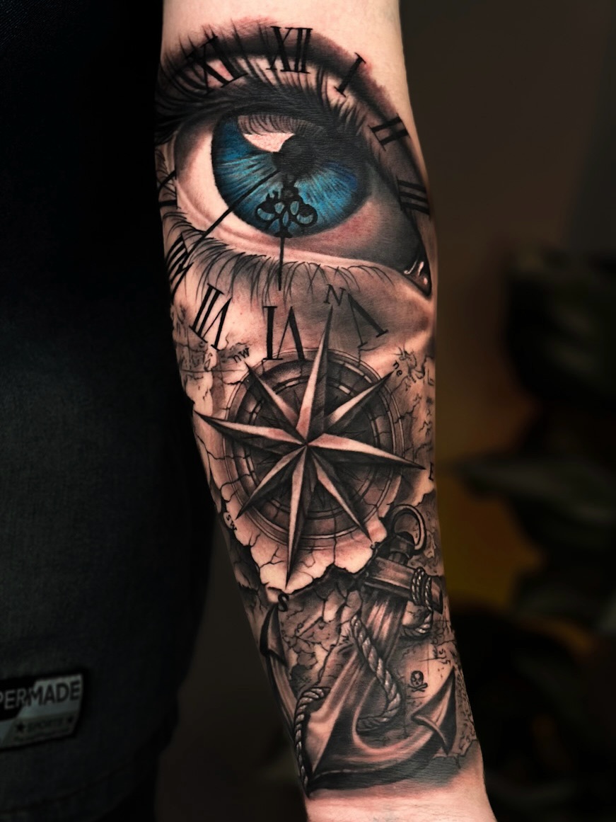 Eye, compass, and anchor surrealism tattoo on the forearm by Nathan, Charlotte, North Carolina