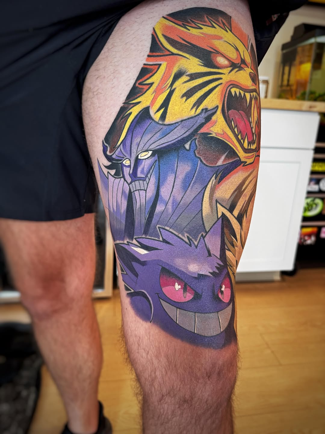 Pokemon characters new school tattoo on the thigh by Derek Hutchison, Des Moines, Iowa
