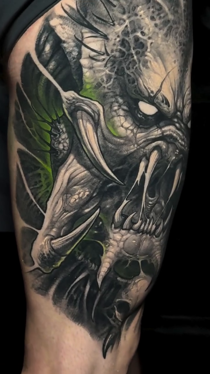 Predator portrait with skull realism tattoo on the forearm by Brandon Herrera