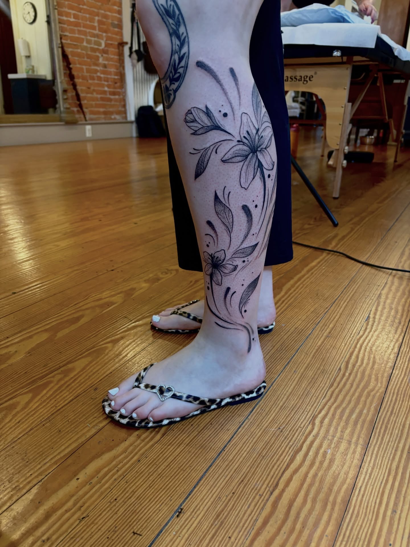 Floral design black and grey tattoo on the calf by V ☆ Cincinnati Tattoo Artist