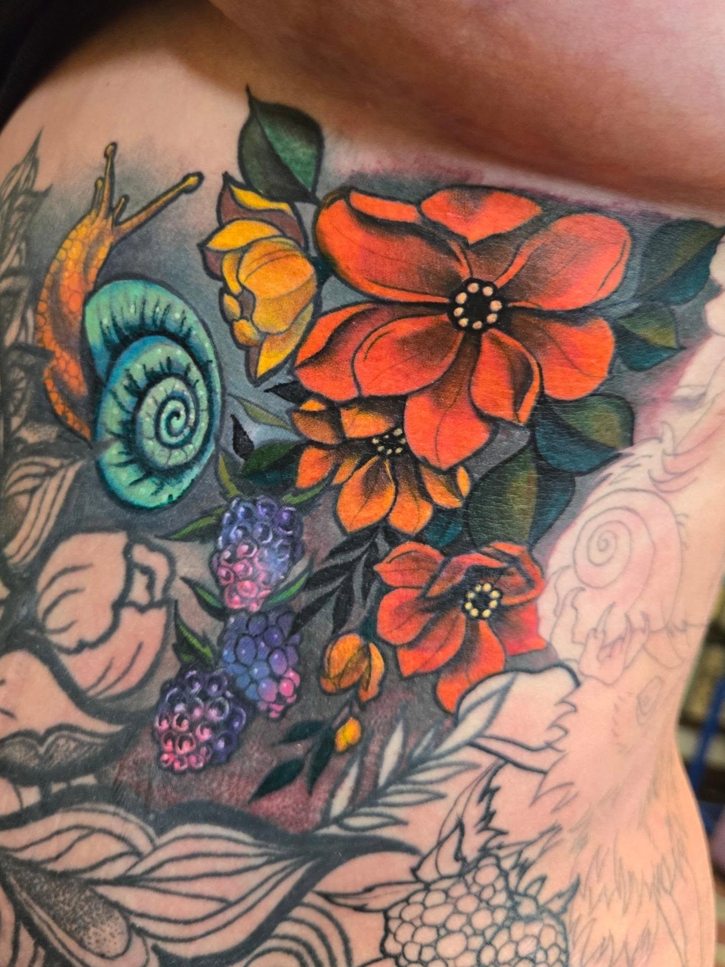Flowers and snail new school tattoo on the chest by Irma π€β¨, Las Vegas, Nevada