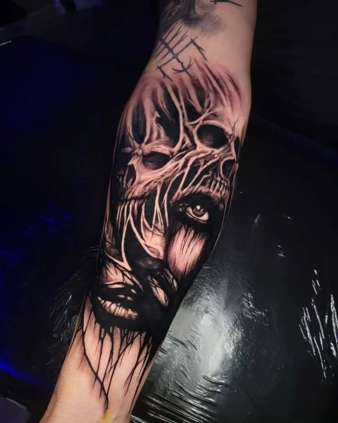 Tattoo by @necronomiconnor — dark_realism, black_and_grey