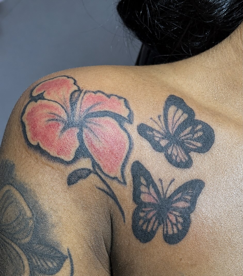 Flower and butterflies fine line tattoo on the shoulder by GasPaccInk