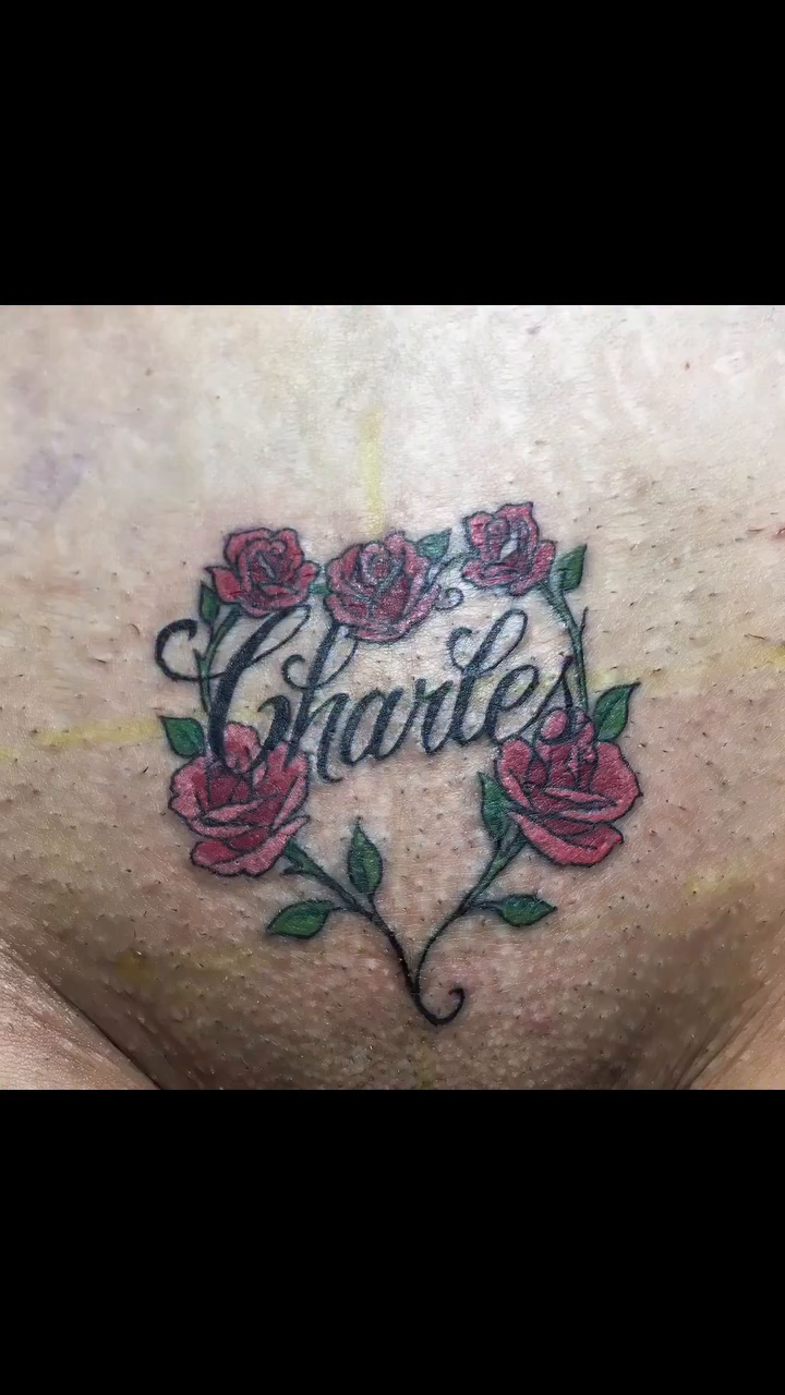 Roses and script tattoo tattoo on the chest by Rafael Marte, White Plains, New York