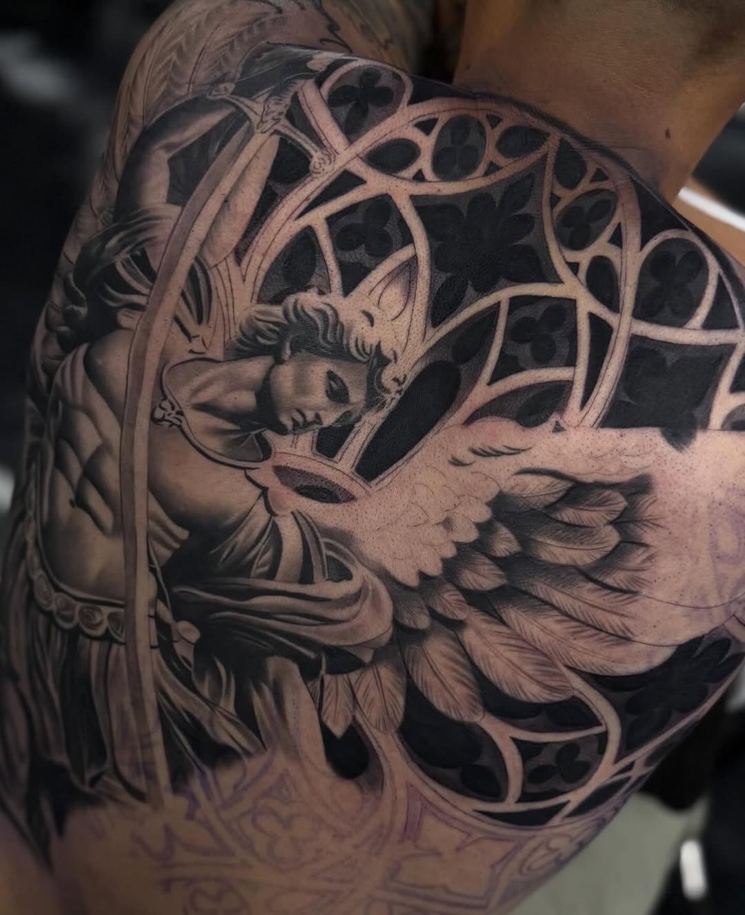 Tattoo by @angel_damiangg — realism, black_and_grey
