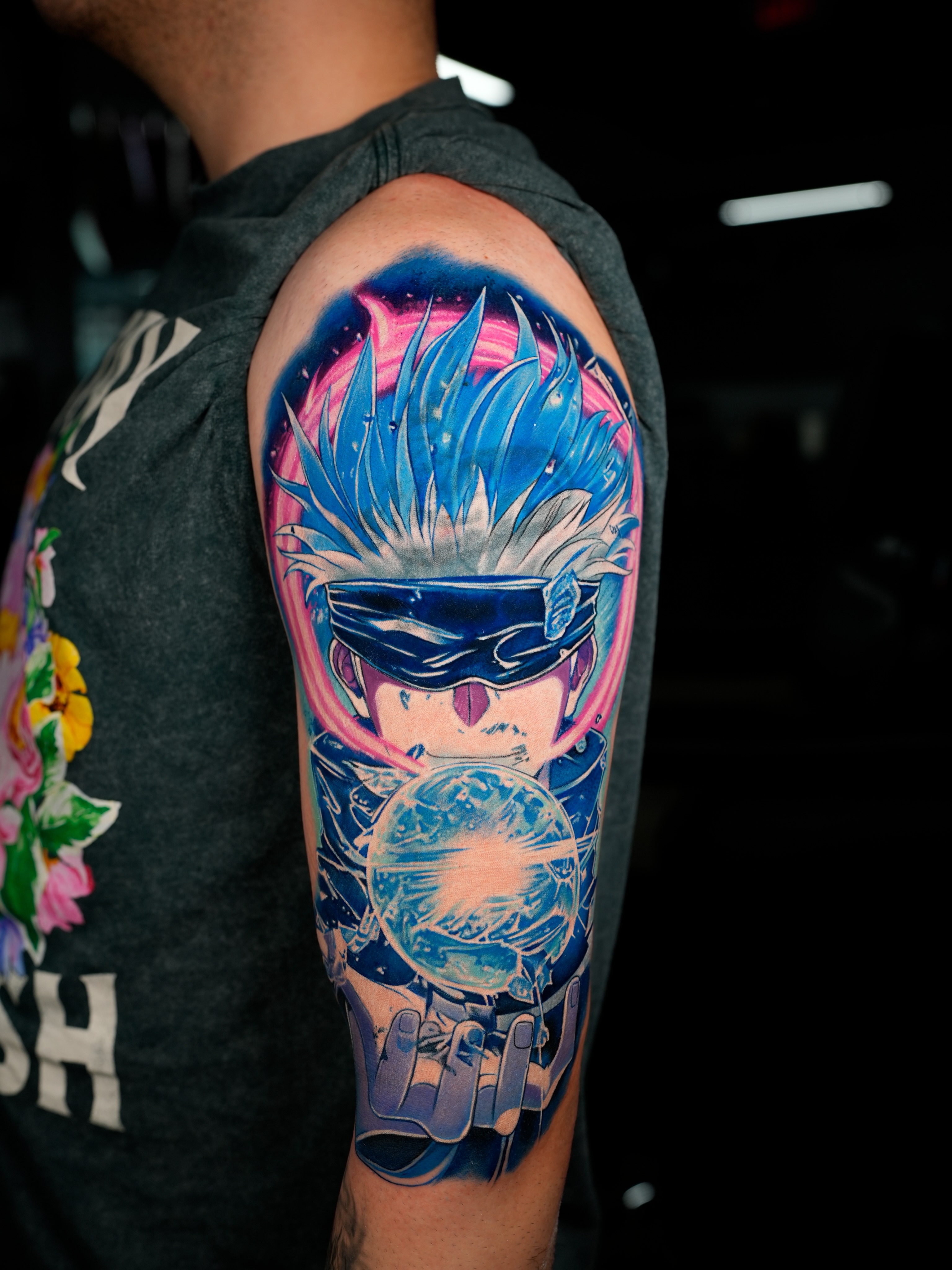 Anime character anime tattoo on the upper arm by Ink Warden  Tattoo