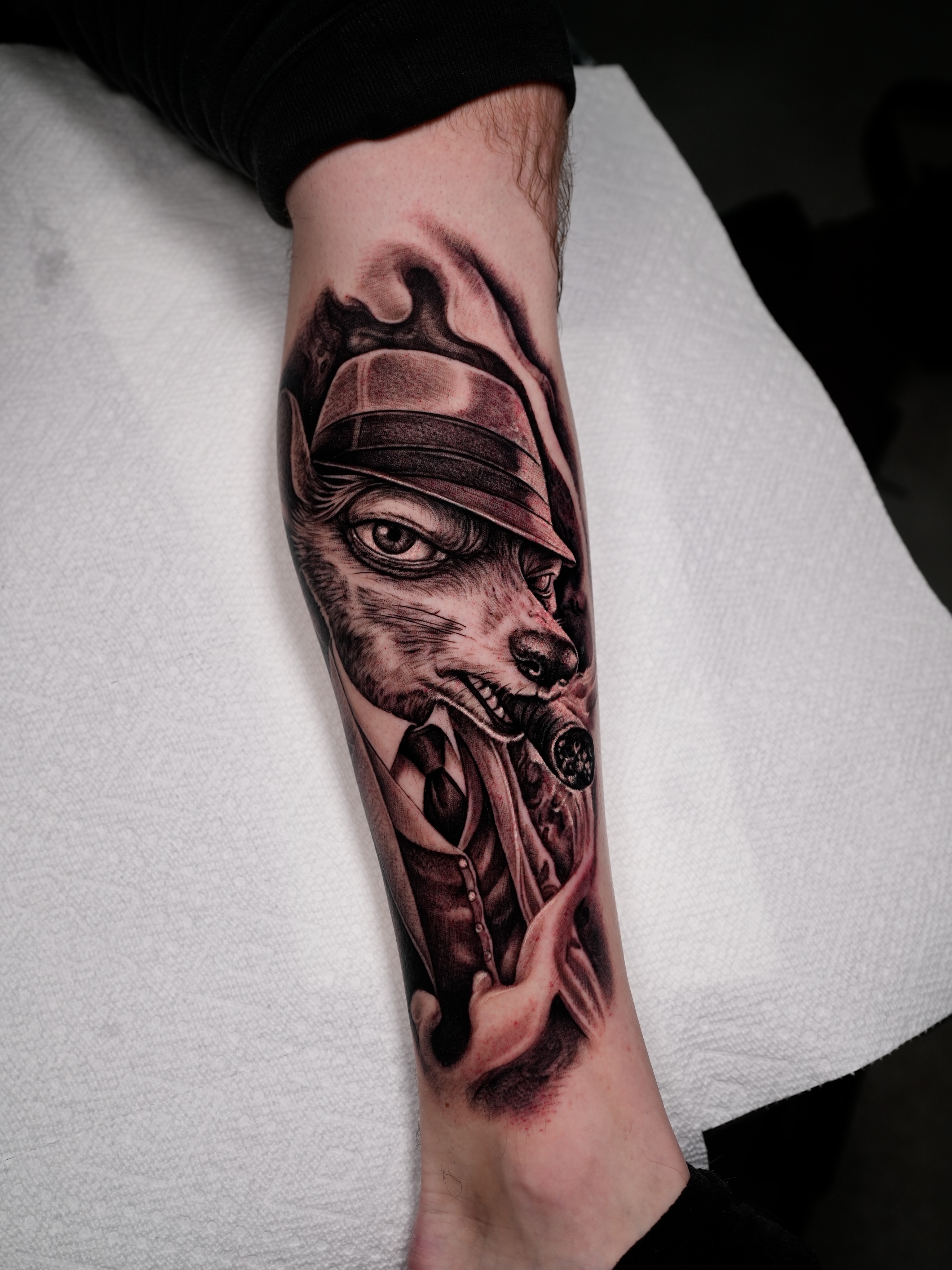 Man with animal head realism tattoo on the forearm by Ink Warden  Tattoo