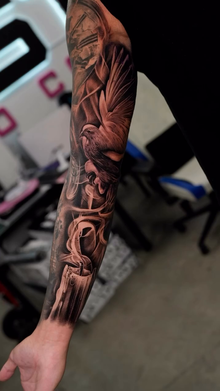 Candle and dove sleeve tattoo realism tattoo on the forearm by Ink Warden  Tattoo
