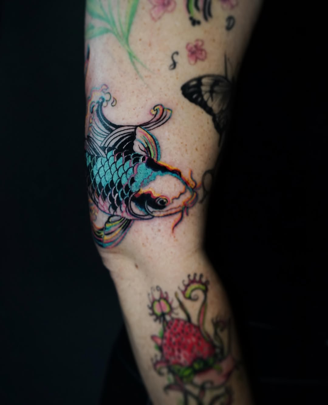 Koi fish new school tattoo on the forearm by Nyahzul - Glitch Tattoo Artist NYC