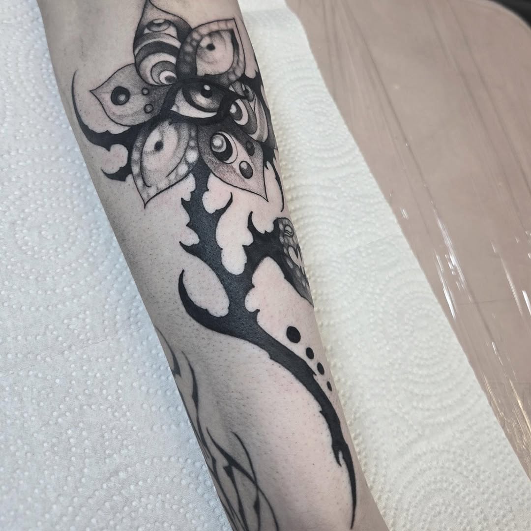 Tattoo by @swampfairie.tattoos — blackwork, ornamental