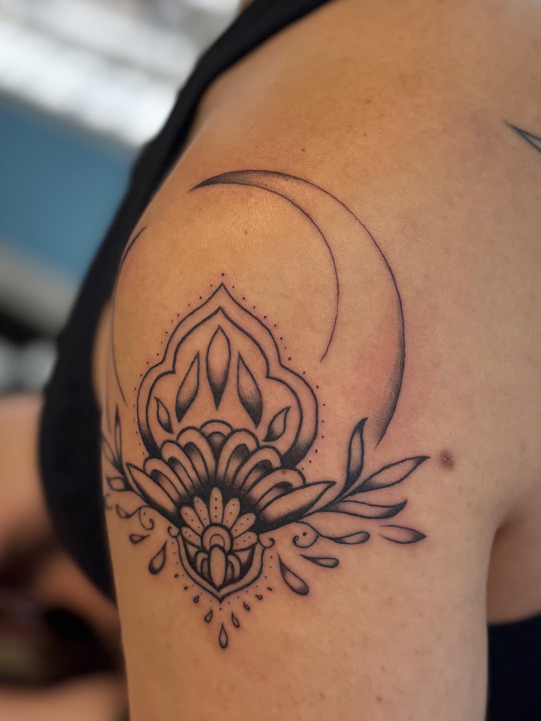 Mandala with crescent moon ornamental tattoo on the shoulder by Béle Benard