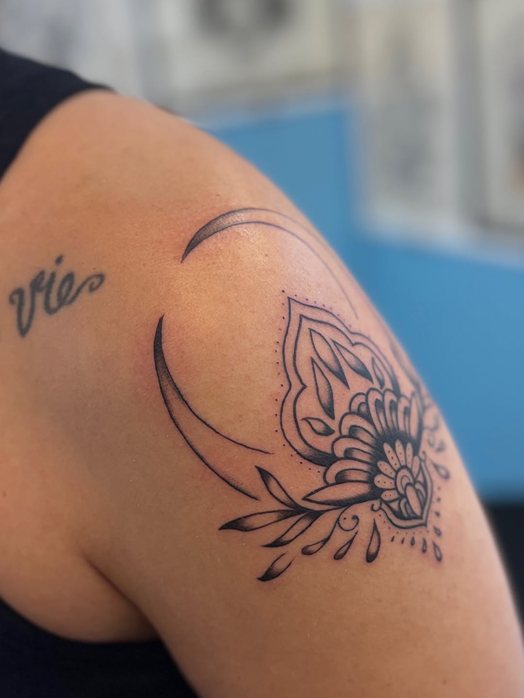 Mandala moon ornamental tattoo on the shoulder by Béle Benard