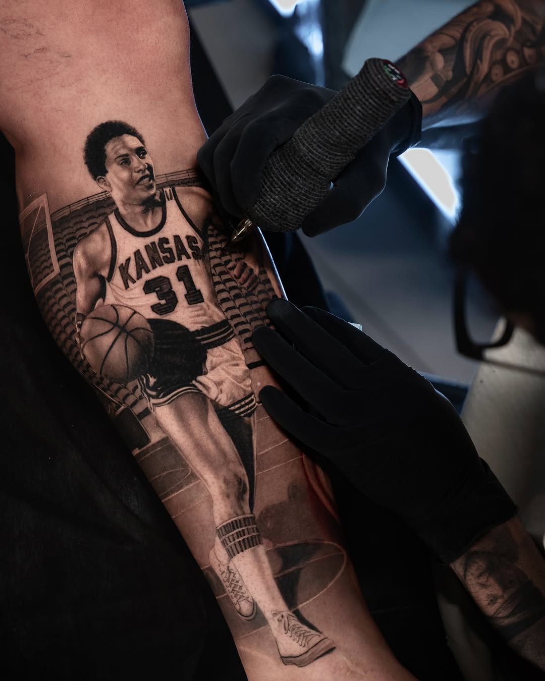 Basketball player surrealism tattoo on the forearm by @_garart_