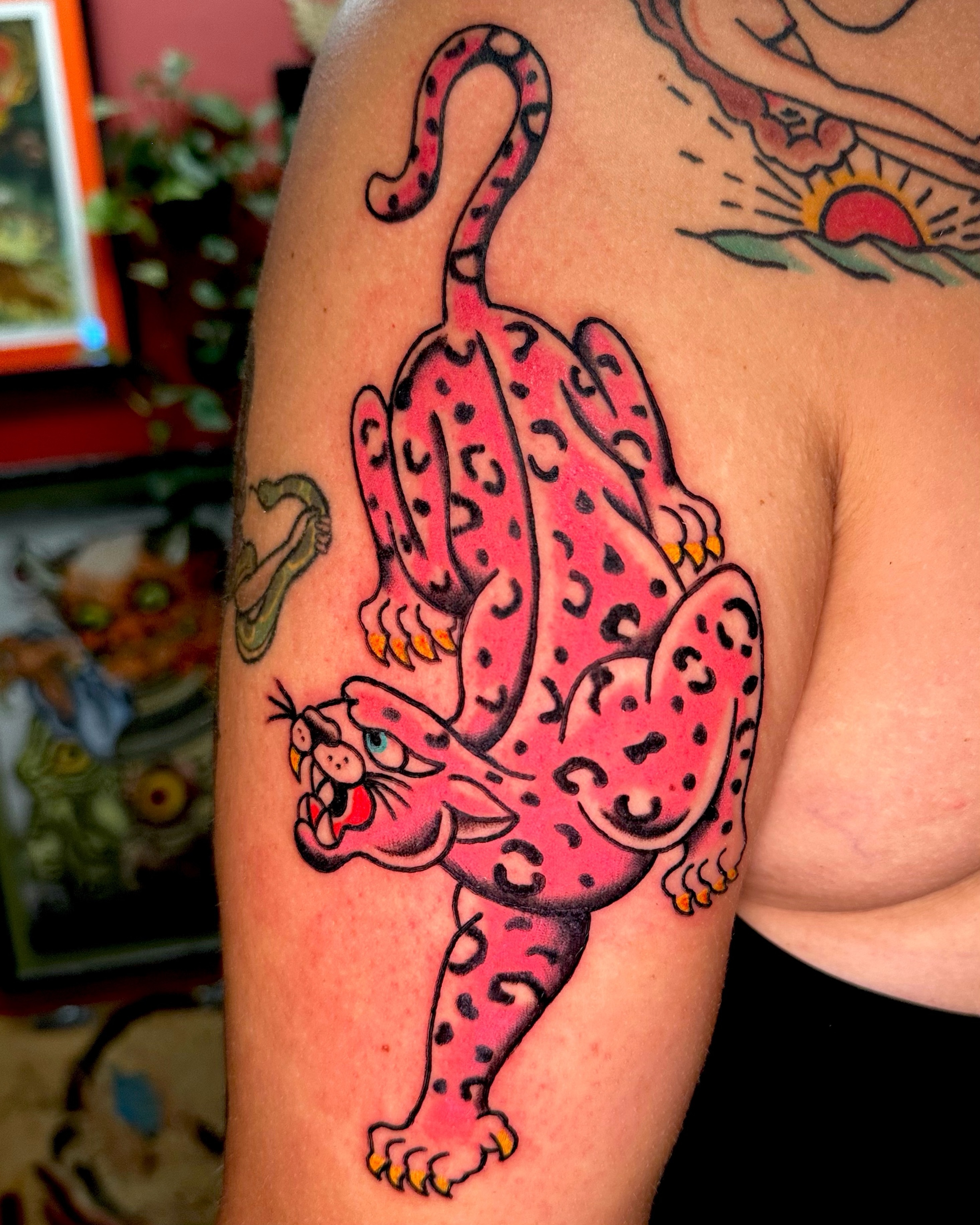 Pink leopard American traditional tattoo on the upper arm by β₯ππππππβ₯ππππβ₯ Traditional Tattoos