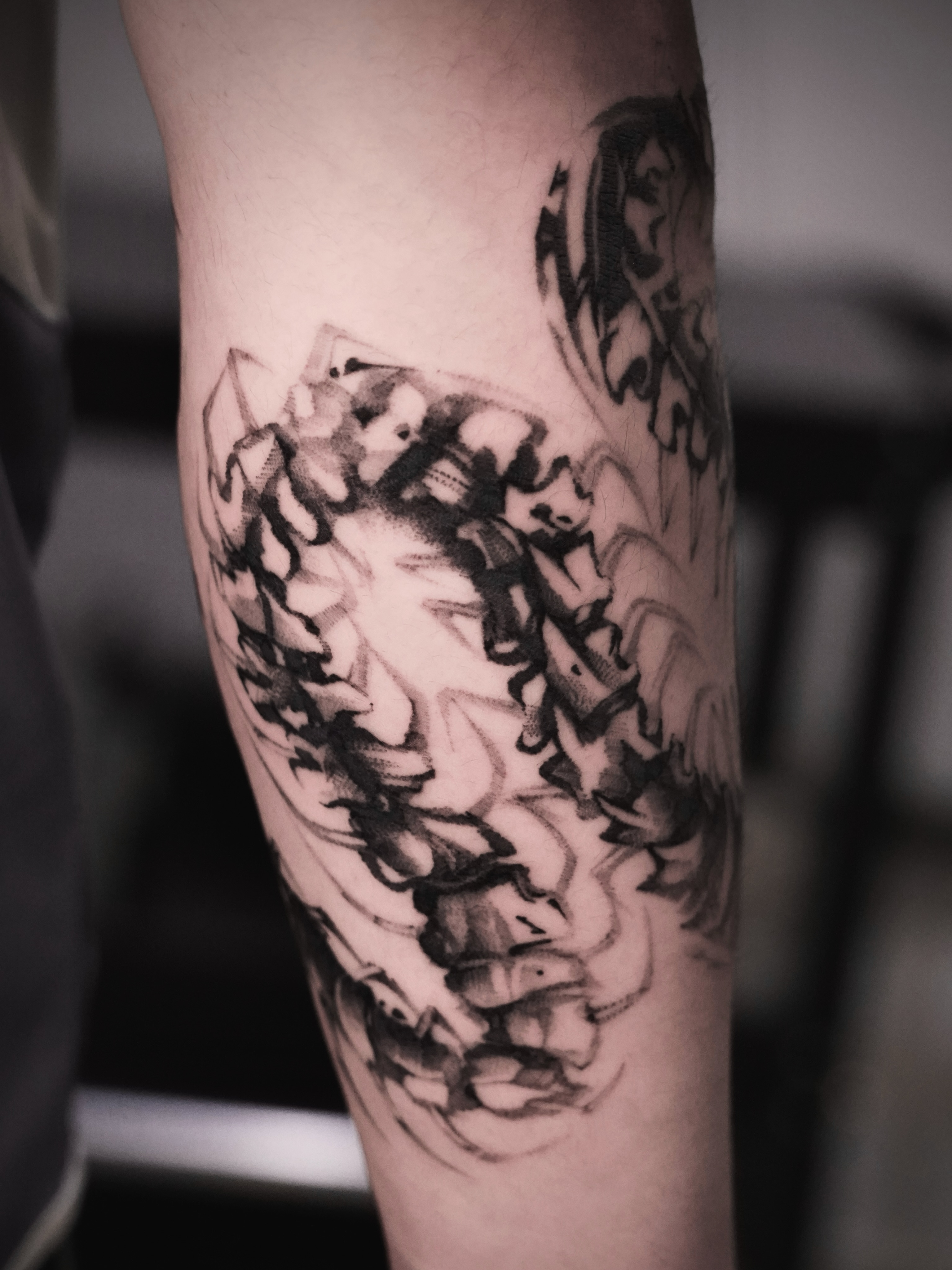 Tattoo by @dowoo_tattoo — black_and_grey, dotwork