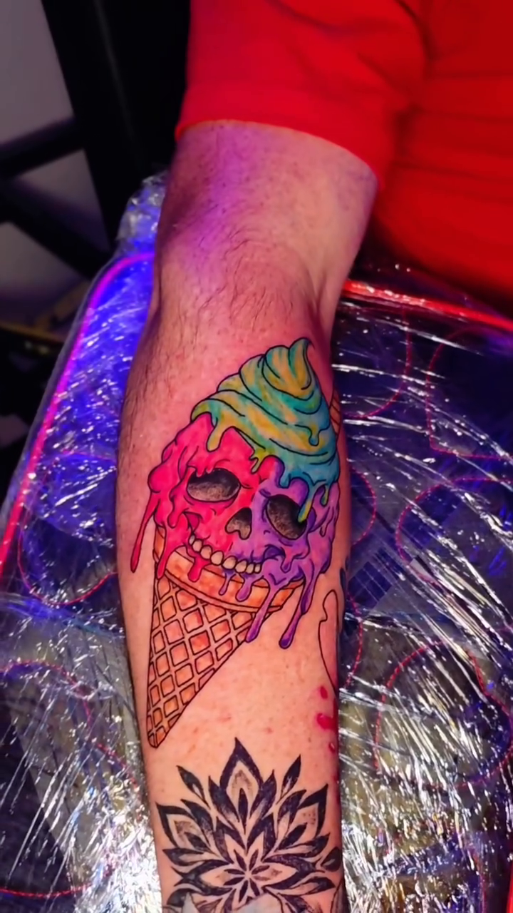 Ice cream cone skull American traditional tattoo on the upper arm by Karley Michelle Moody