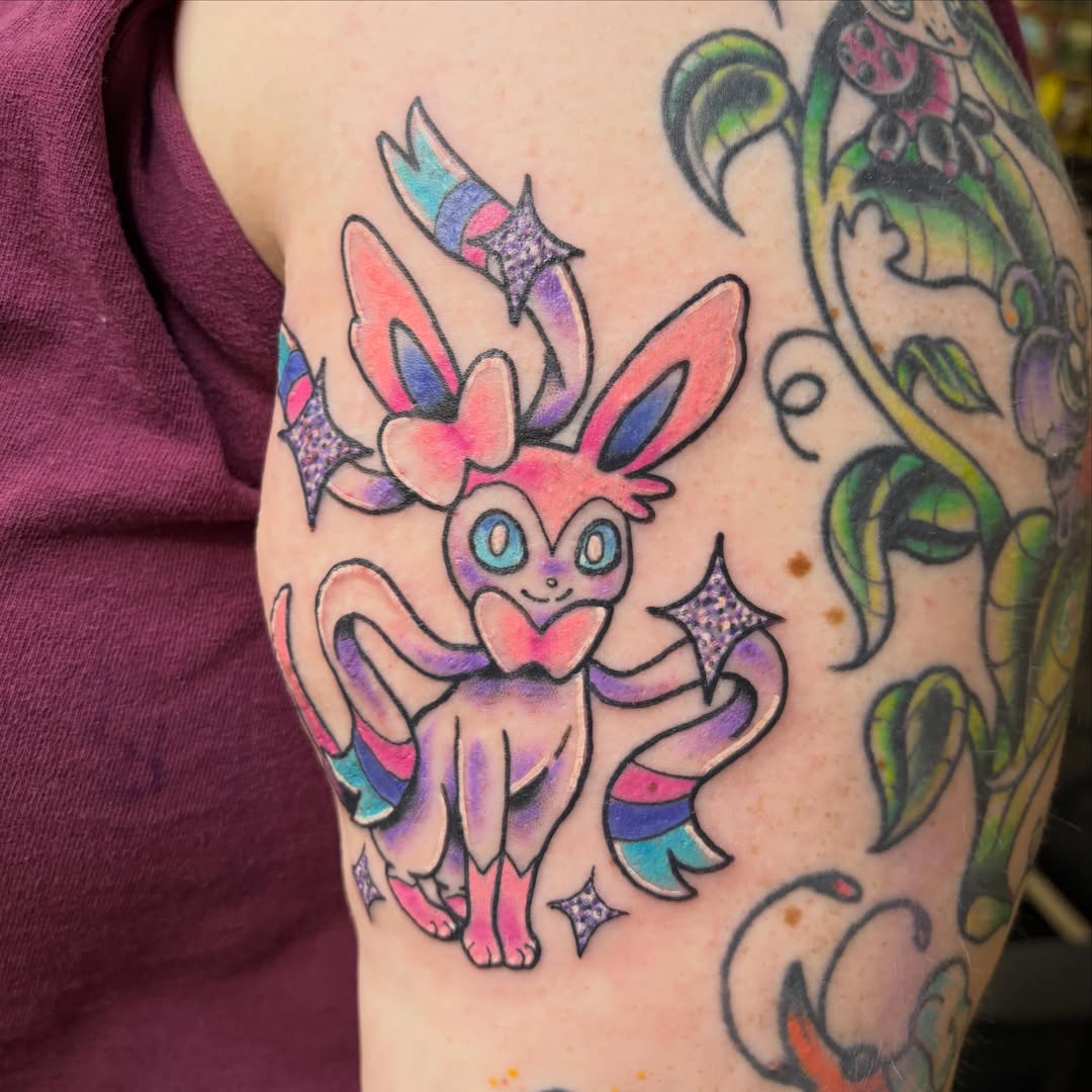 Jolteon new school tattoo on the shoulder by Hailey Hermosillo