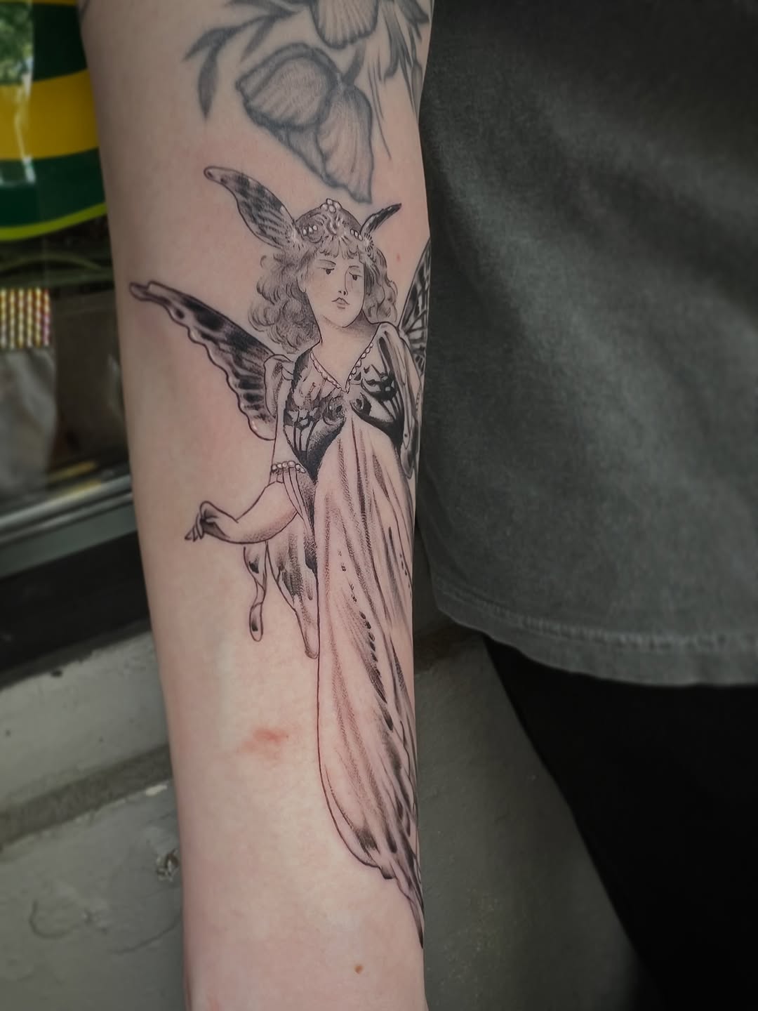 Tattoo by @southpaw.stipple — black_and_grey, realism