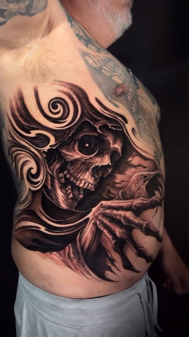 Tattoo by @jamesstrickland — dark_realism, black_and_grey