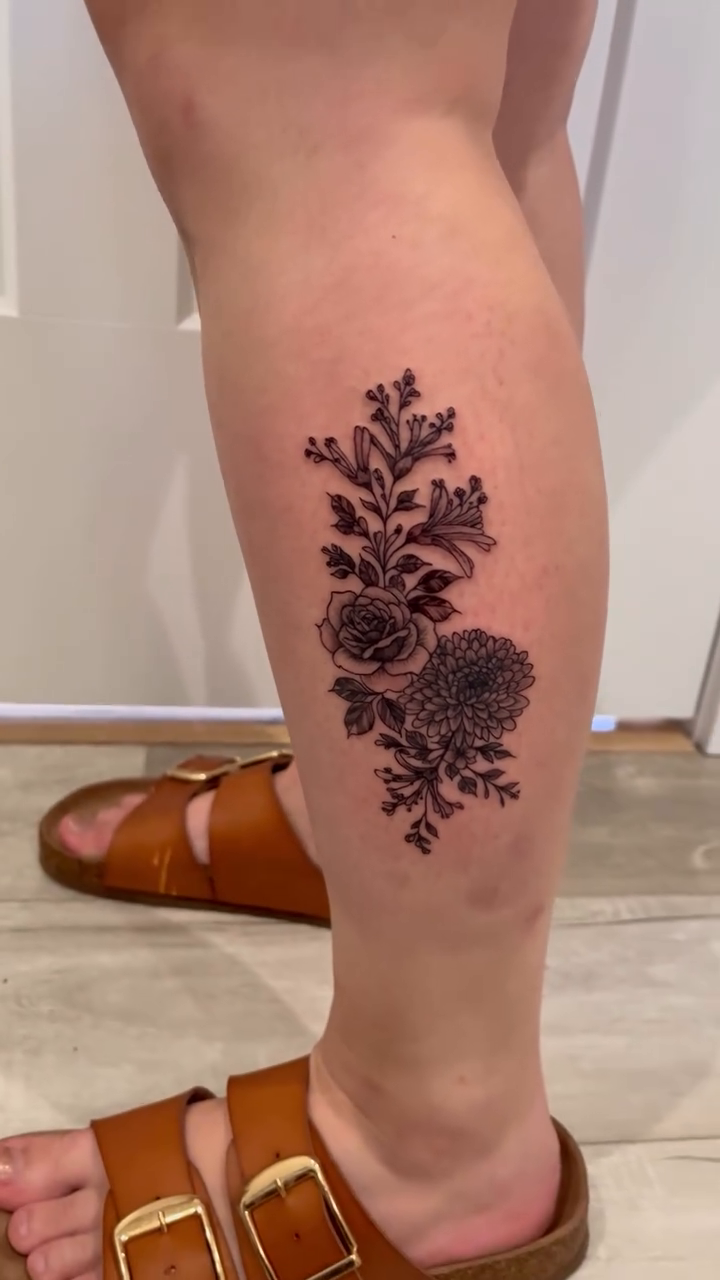 Floral arrangement tattoo ornamental tattoo on the calf by DL Tats, Cape Girardeau, Missouri