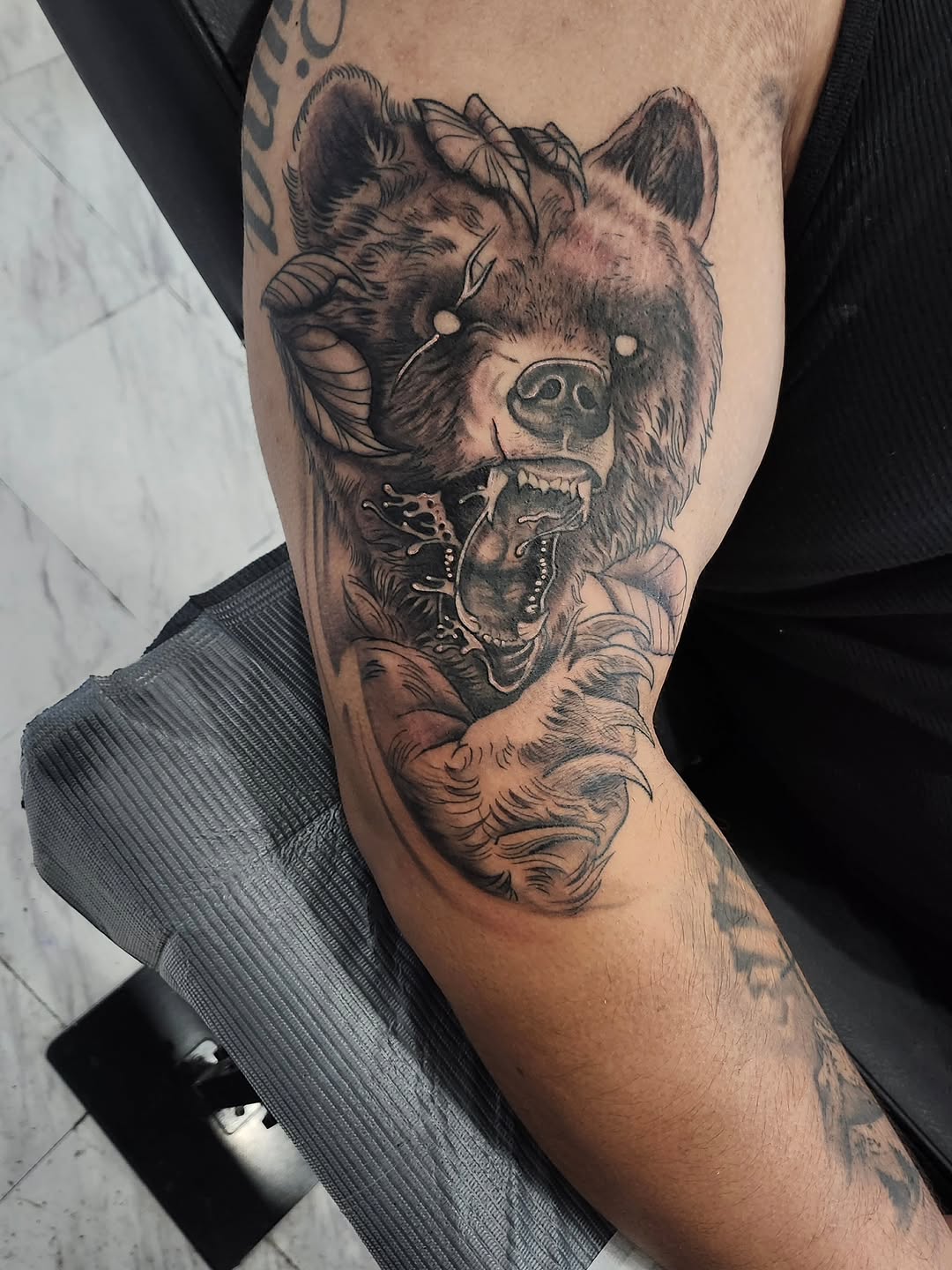 Tattoo by @htx_herc — realism, black_and_grey