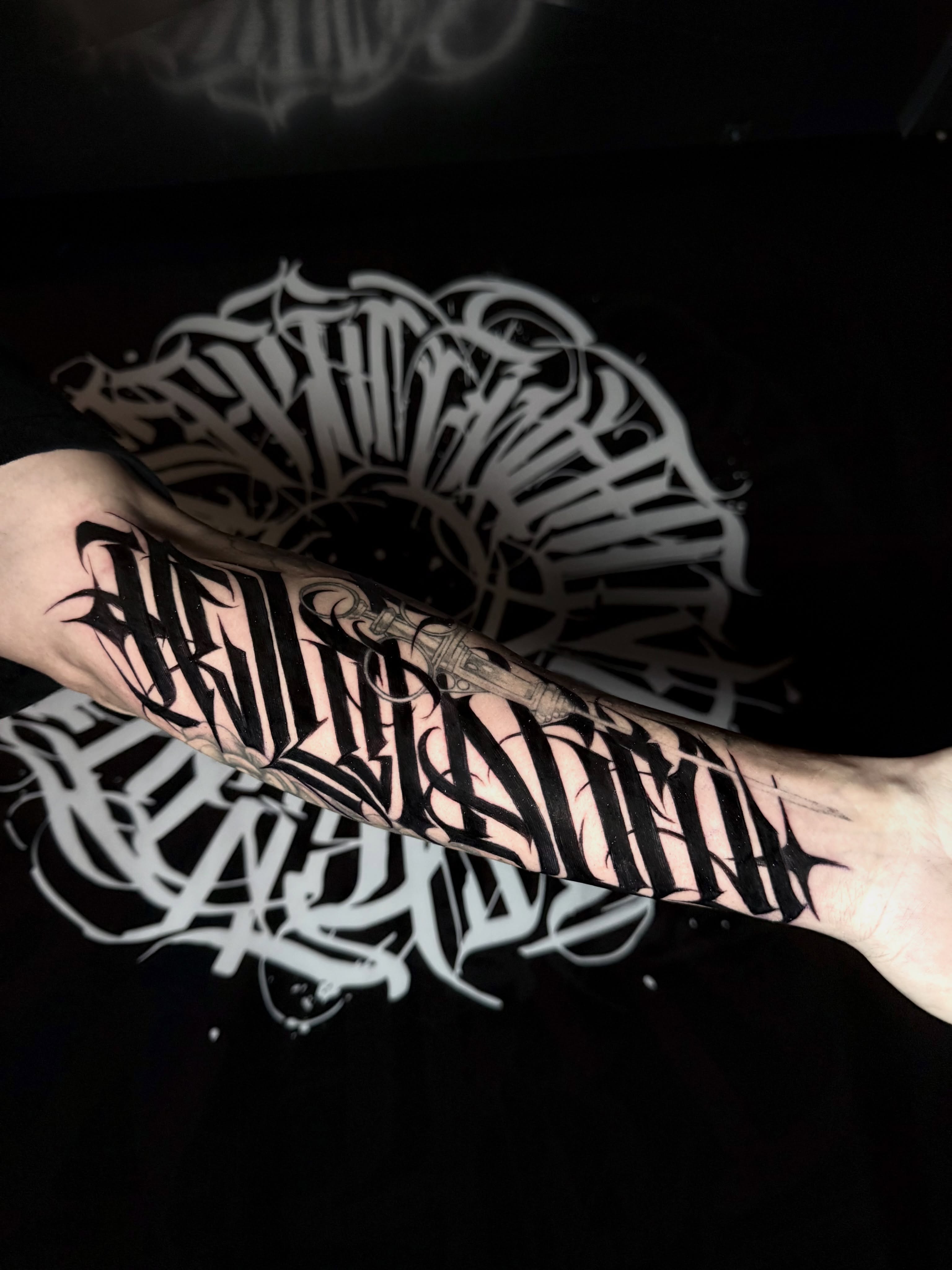 Tattoo by @wiseroner — lettering_script, blackwork