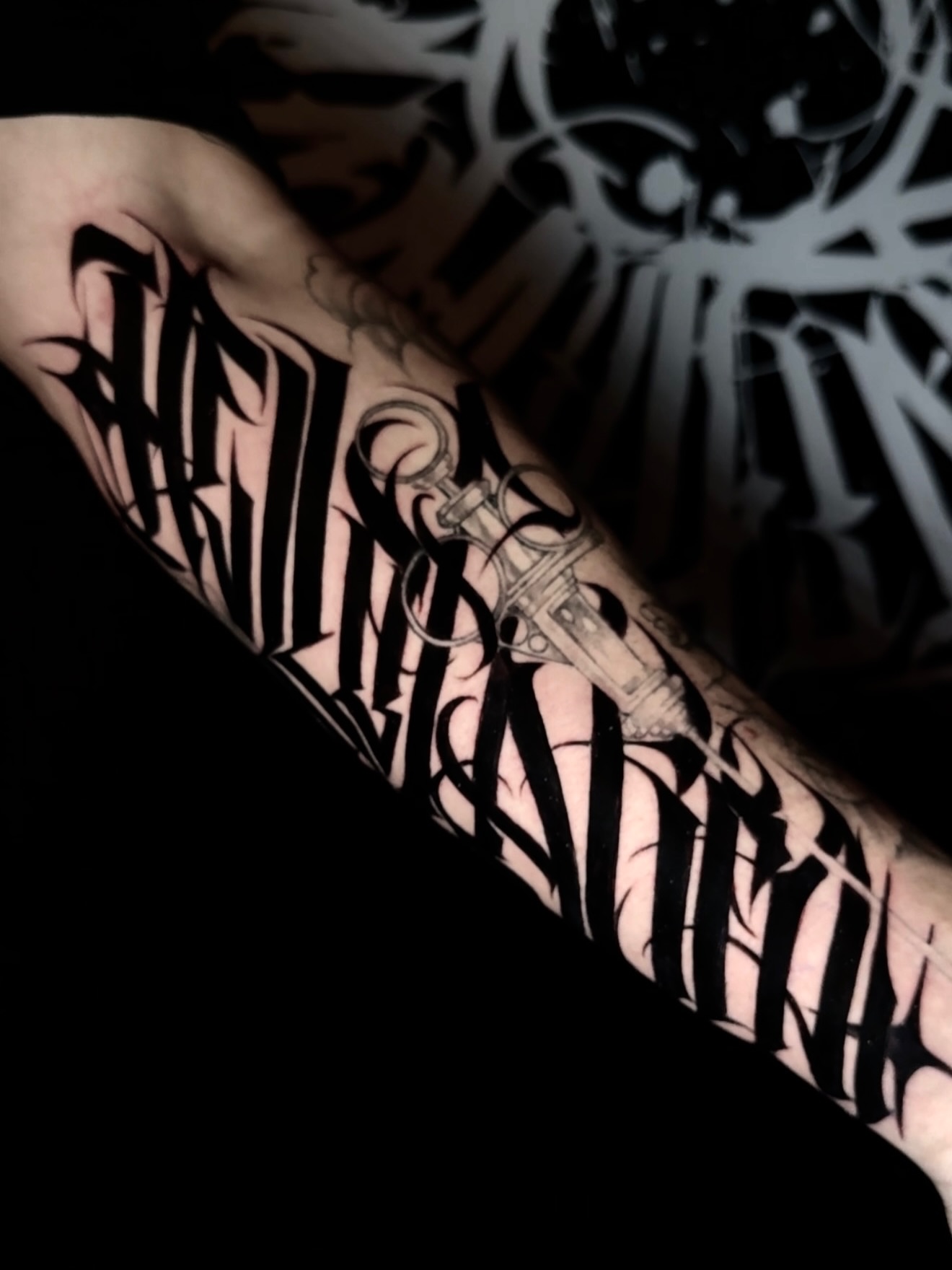 Tattoo by @wiseroner — lettering_script, blackwork