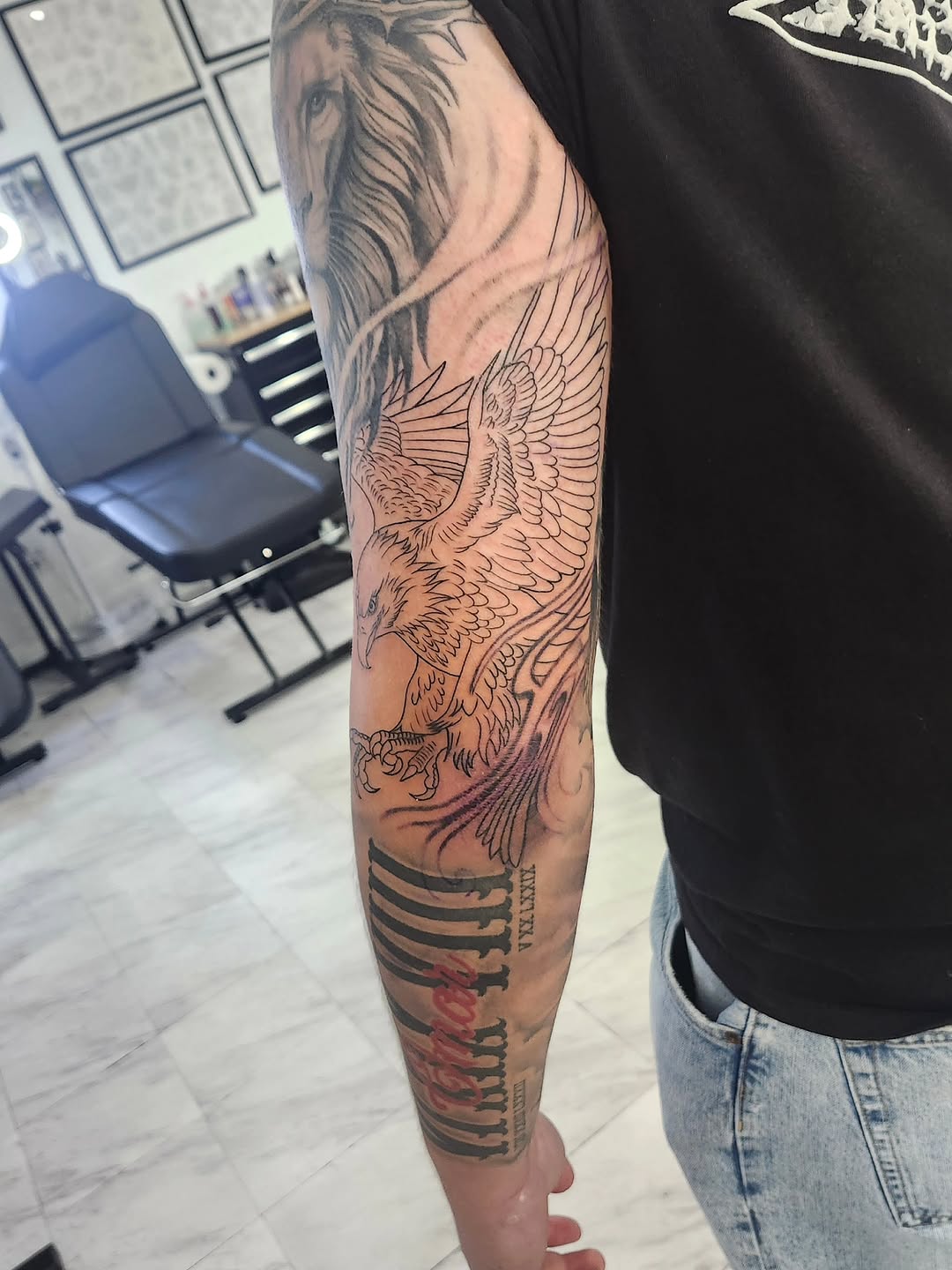 Tattoo by @htx_herc — black_and_grey, lettering_script