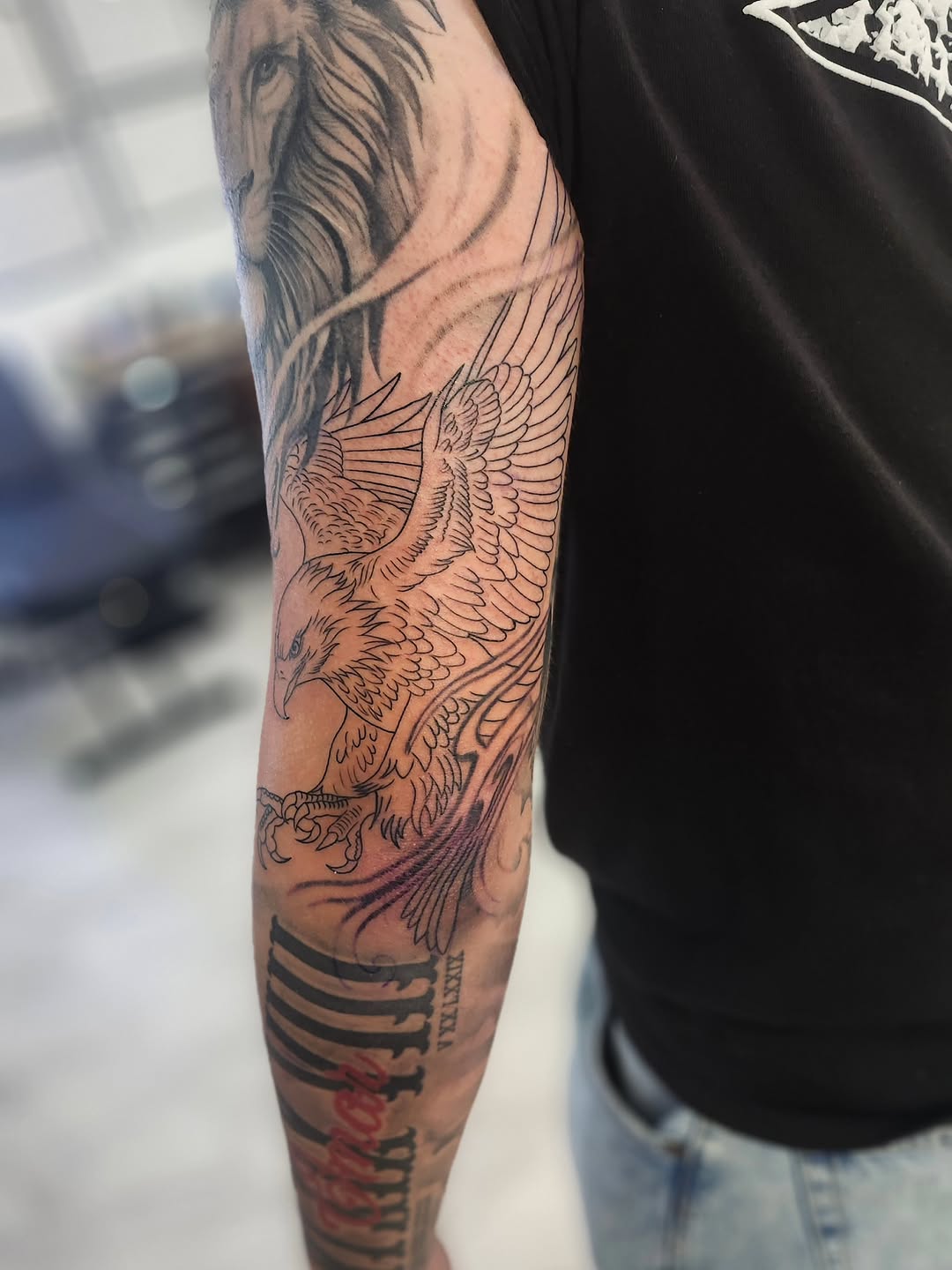 Tattoo by @htx_herc — black_and_grey, lettering_script