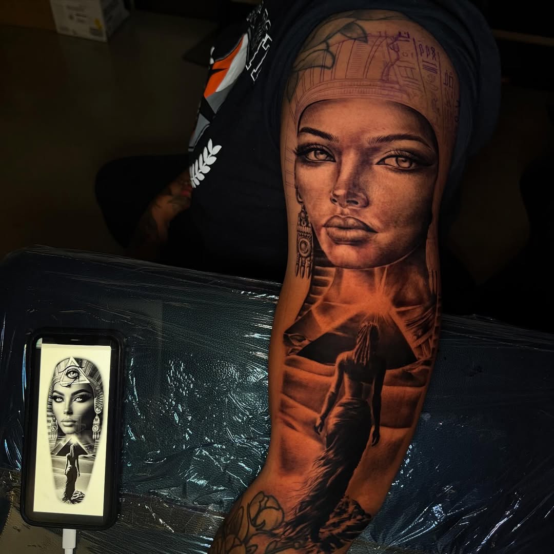 Egyptian woman and pyramid realism tattoo on the forearm by Chicago Tattoo Artist
