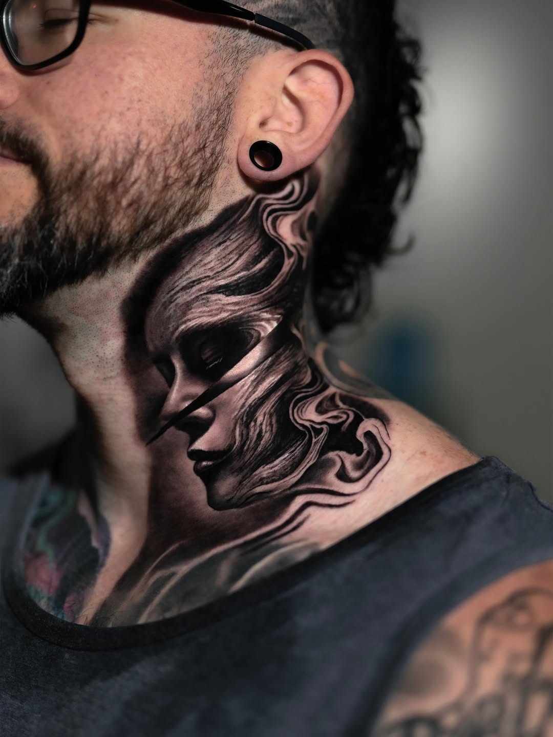 Abstract face and smoke realism tattoo on the neck by angel.antonio.tattoos