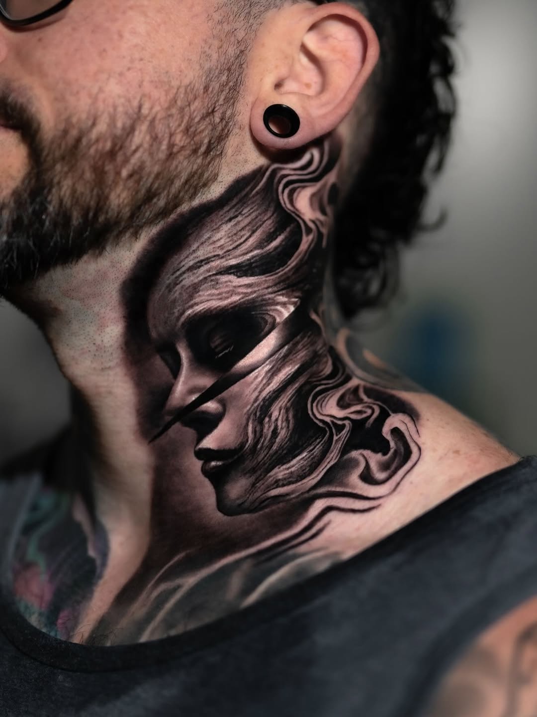 Face with abstract elements realism tattoo on the neck by angel.antonio.tattoos