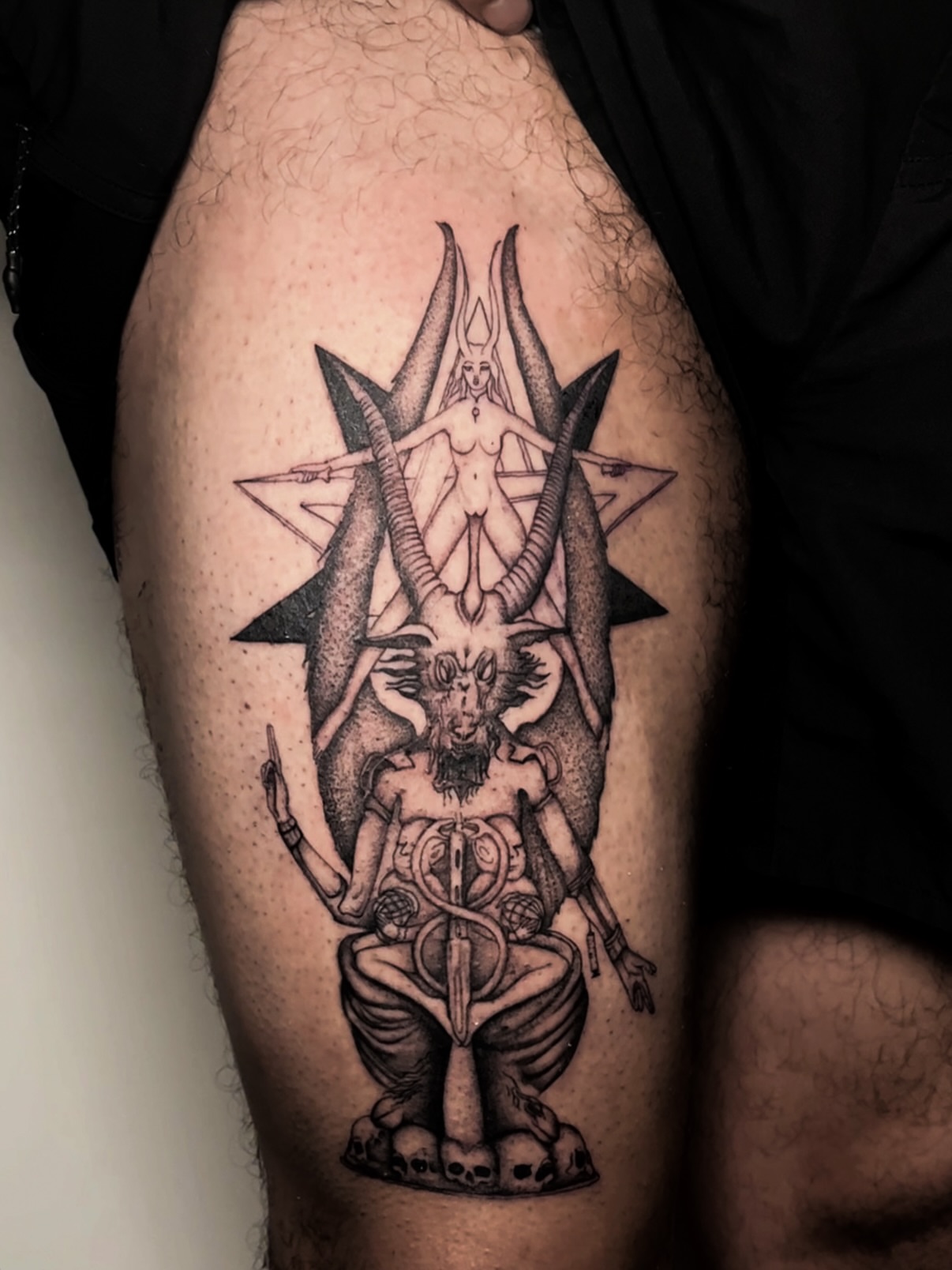 Demon geometric tattoo on the thigh by Priscila, Los Angeles, California
