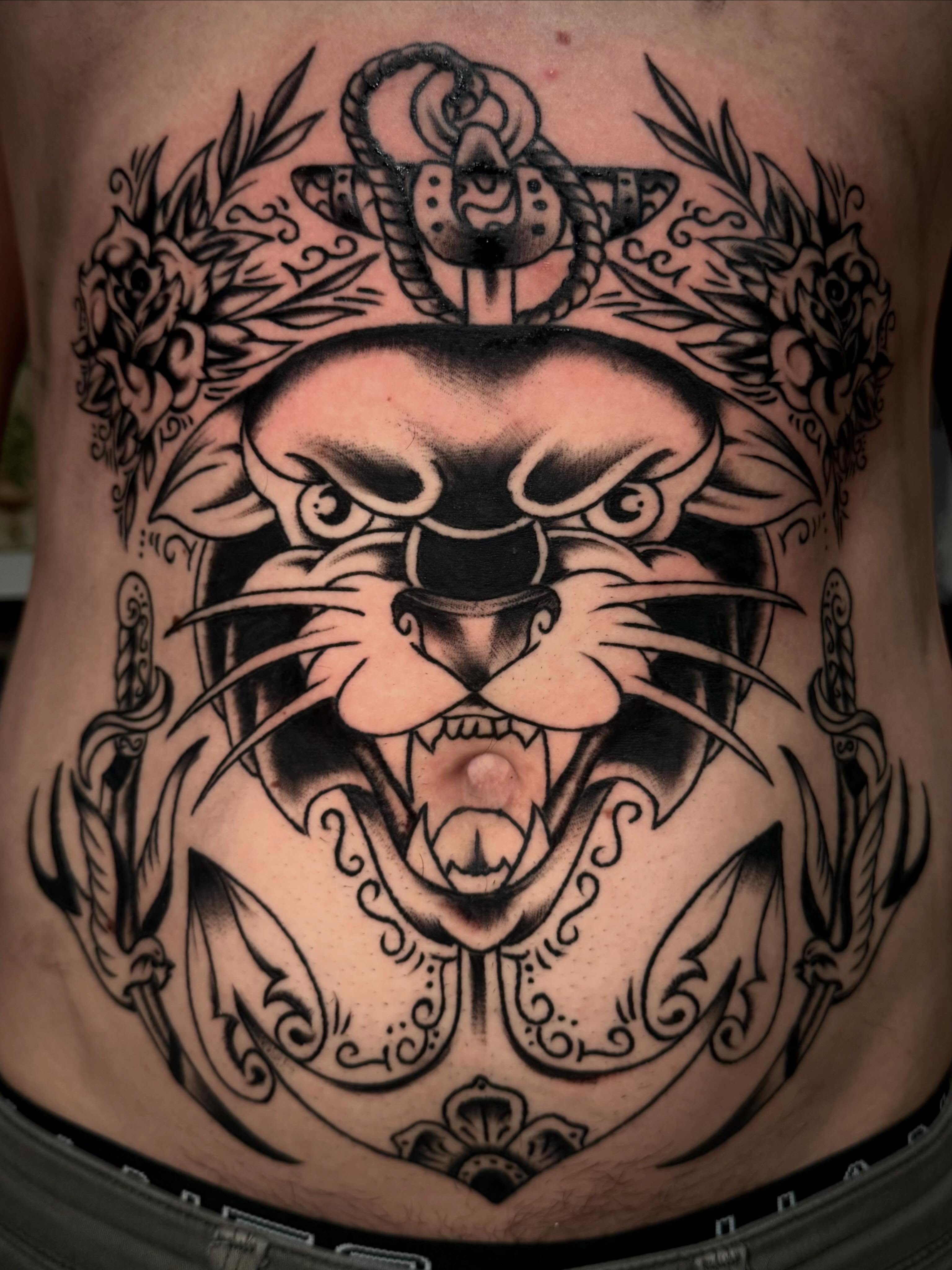 Panther American traditional tattoo on the ribs by Lydia