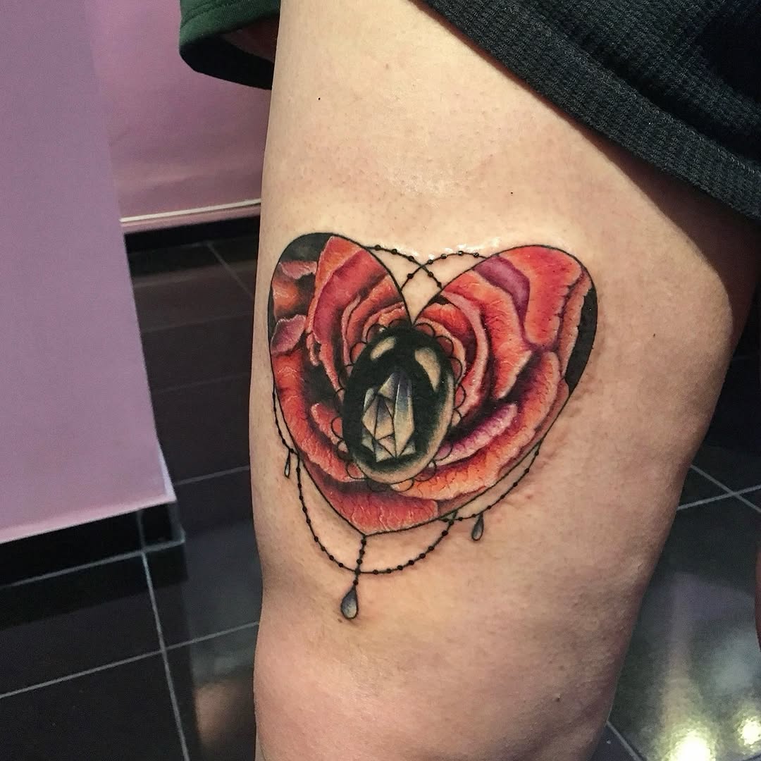Heart shaped rose with gem neo-traditional tattoo on the thigh by Yana Aizen
