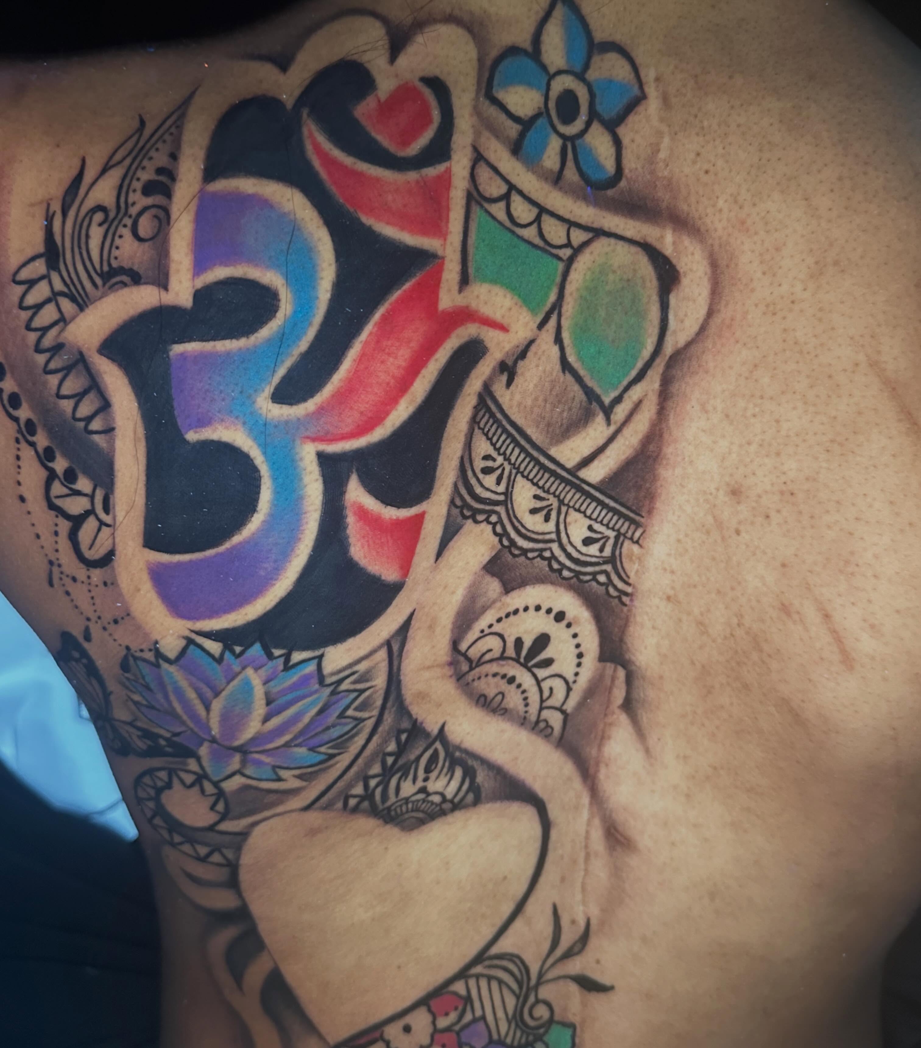 Om symbol American traditional tattoo on the chest by I Am Mawlo! Welcome Fellow Mawlonians