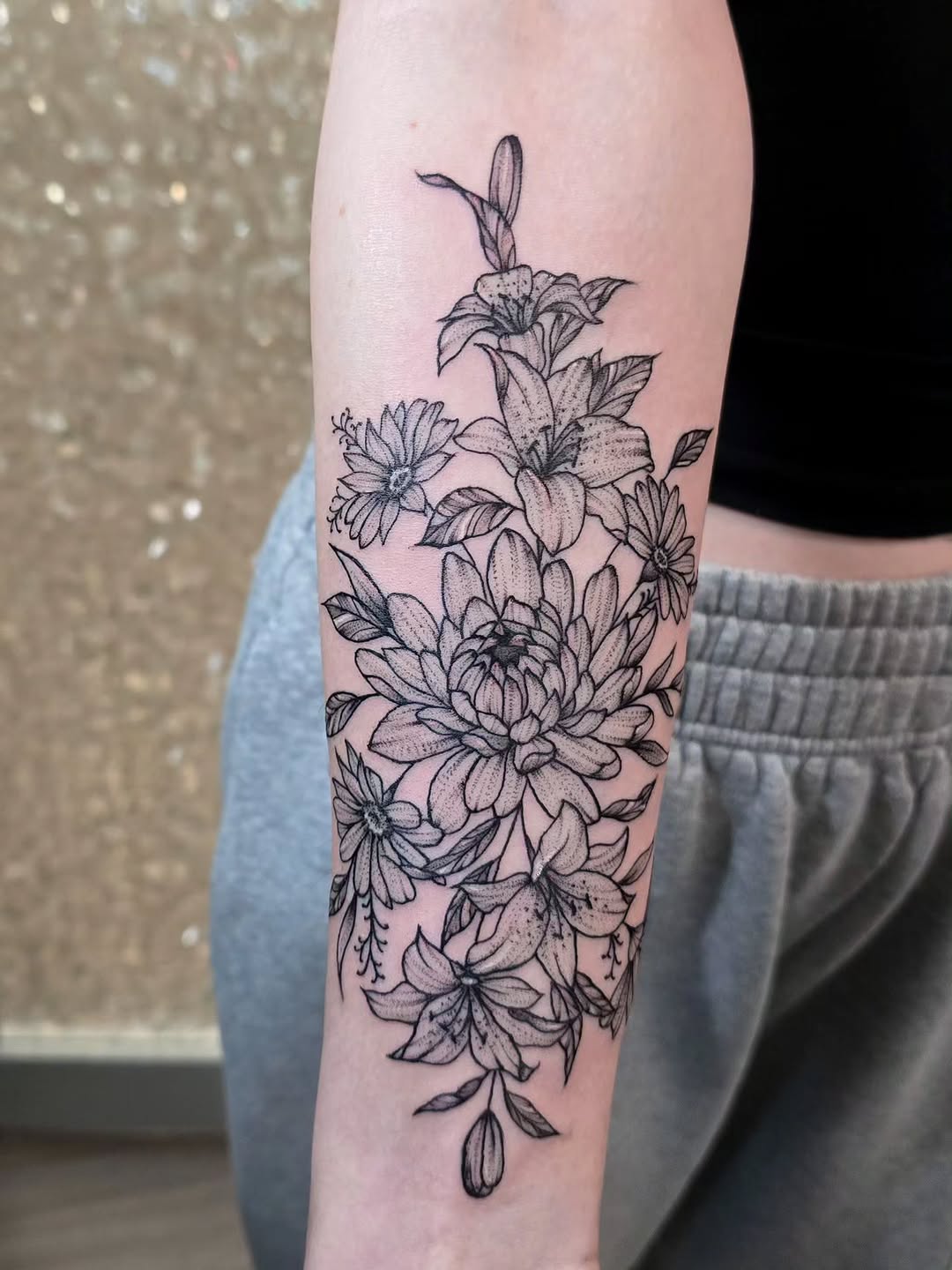 Floral arrangement fine line tattoo on the forearm by Hope 🌙, Cincinnati