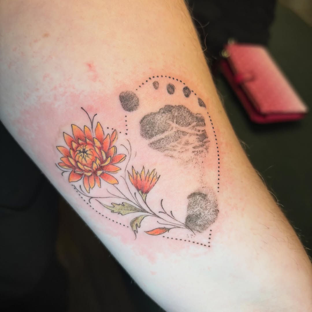Tattoo by @tattoo.by.q — dotwork, watercolor