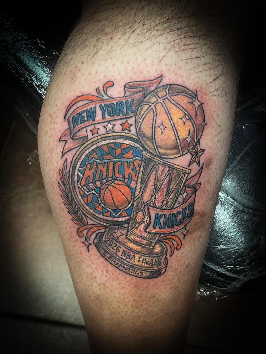 New York Knicks basketball championship trophy tattoo on the thigh by Melissa Peña NYC
