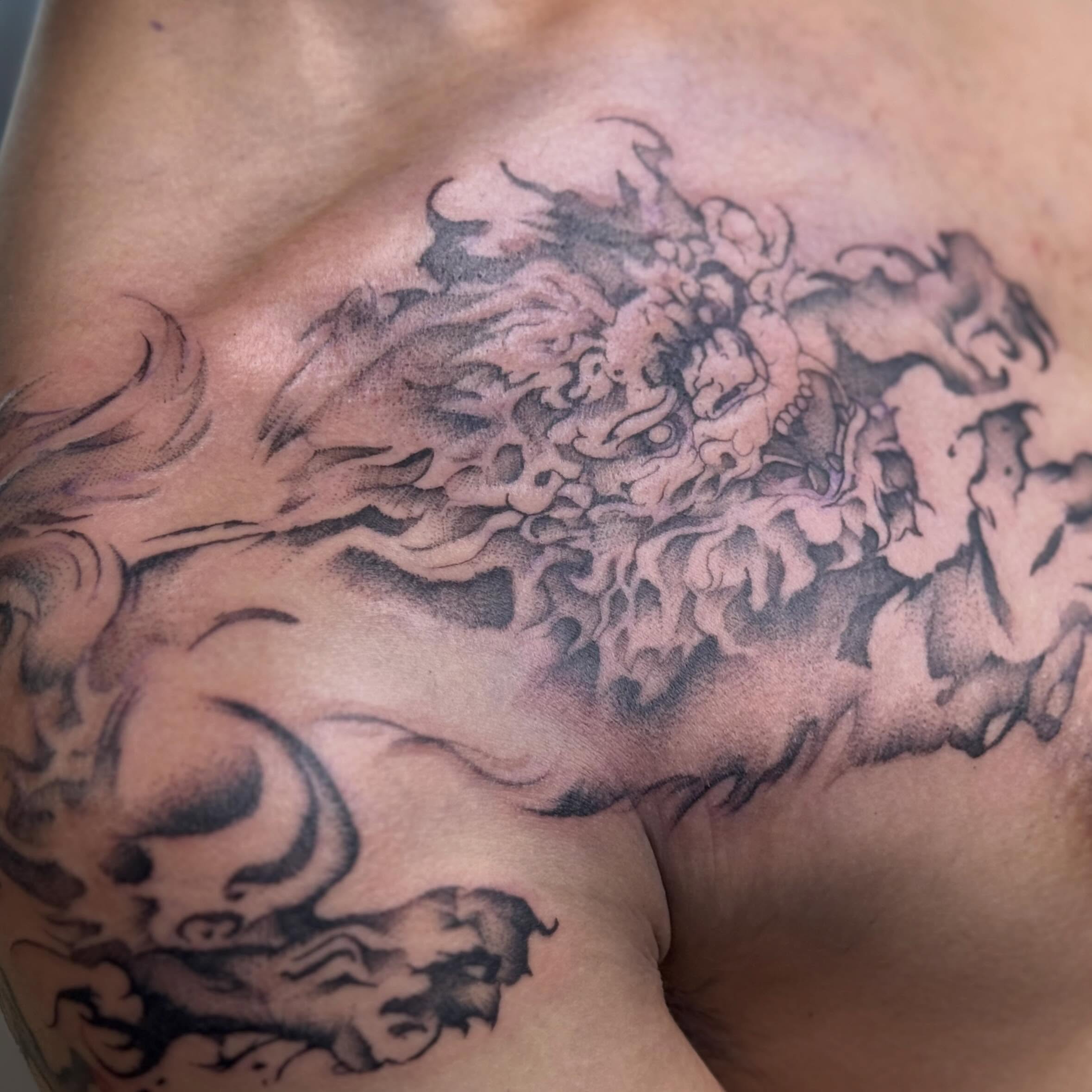 Dragon black and grey tattoo on the chest by Tattoo, San Diego, California