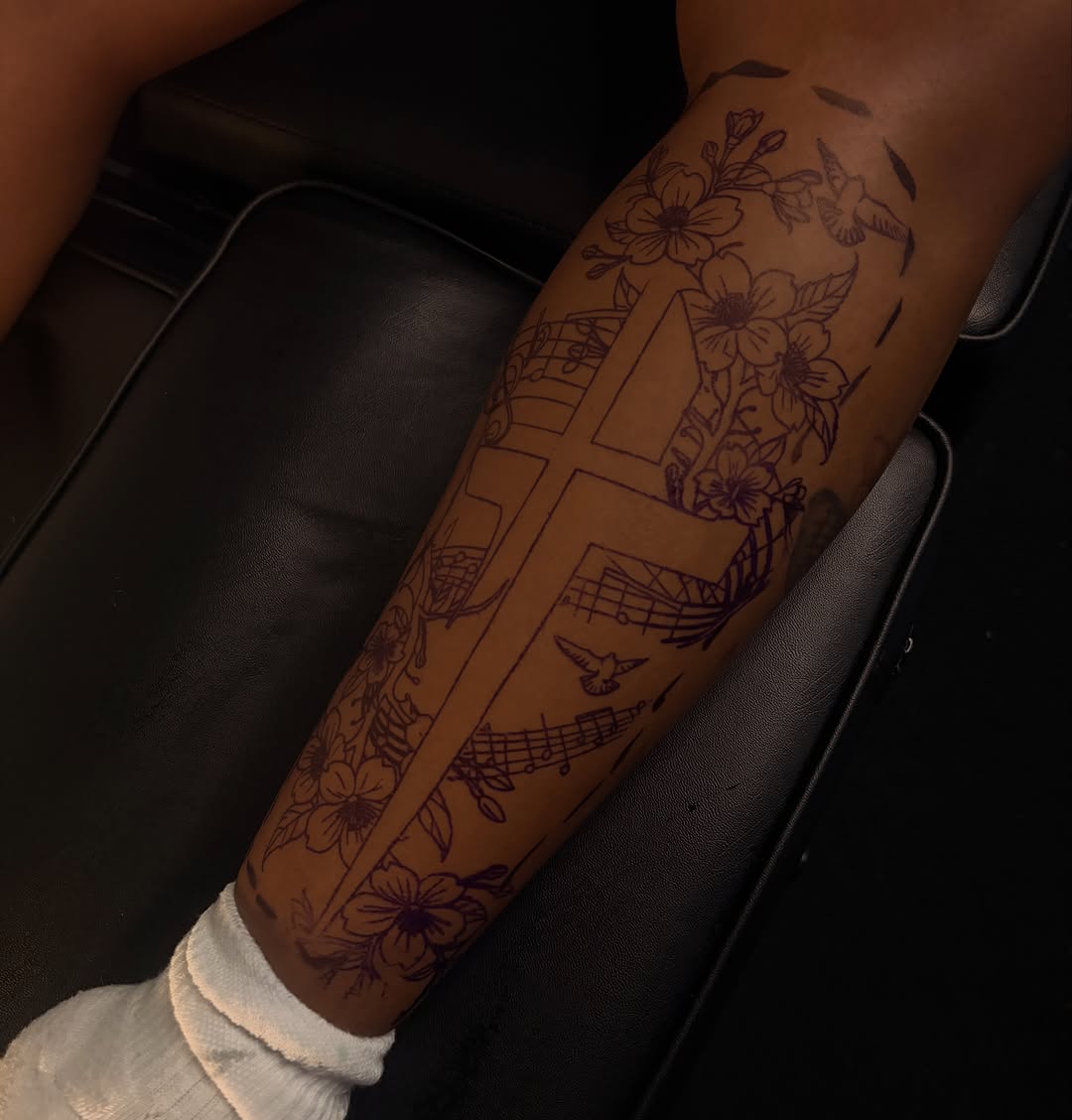 Cross with flowers and music notes cyber sigilism tattoo on the forearm by Female Cleveland Tat Artist ๐