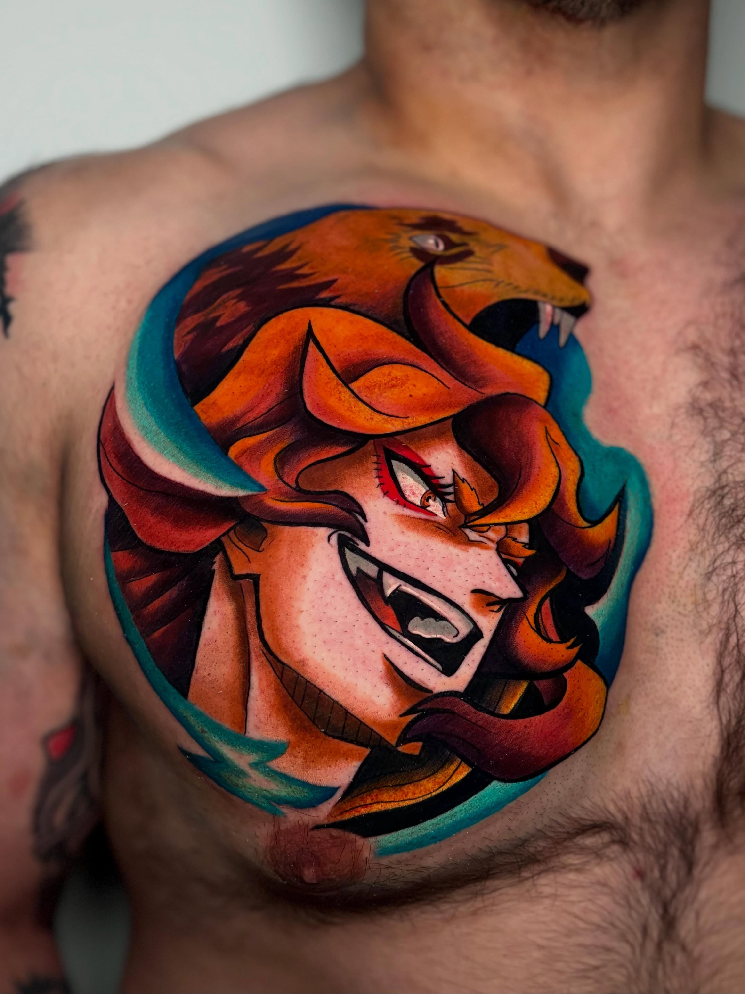 Lion geometric tattoo on the chest by Jess