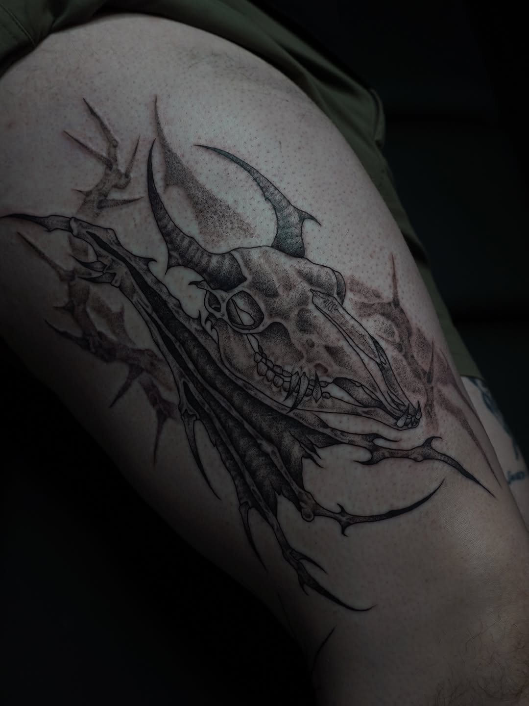 Tattoo by @no_caps_tattoo — dark_realism, black_and_grey