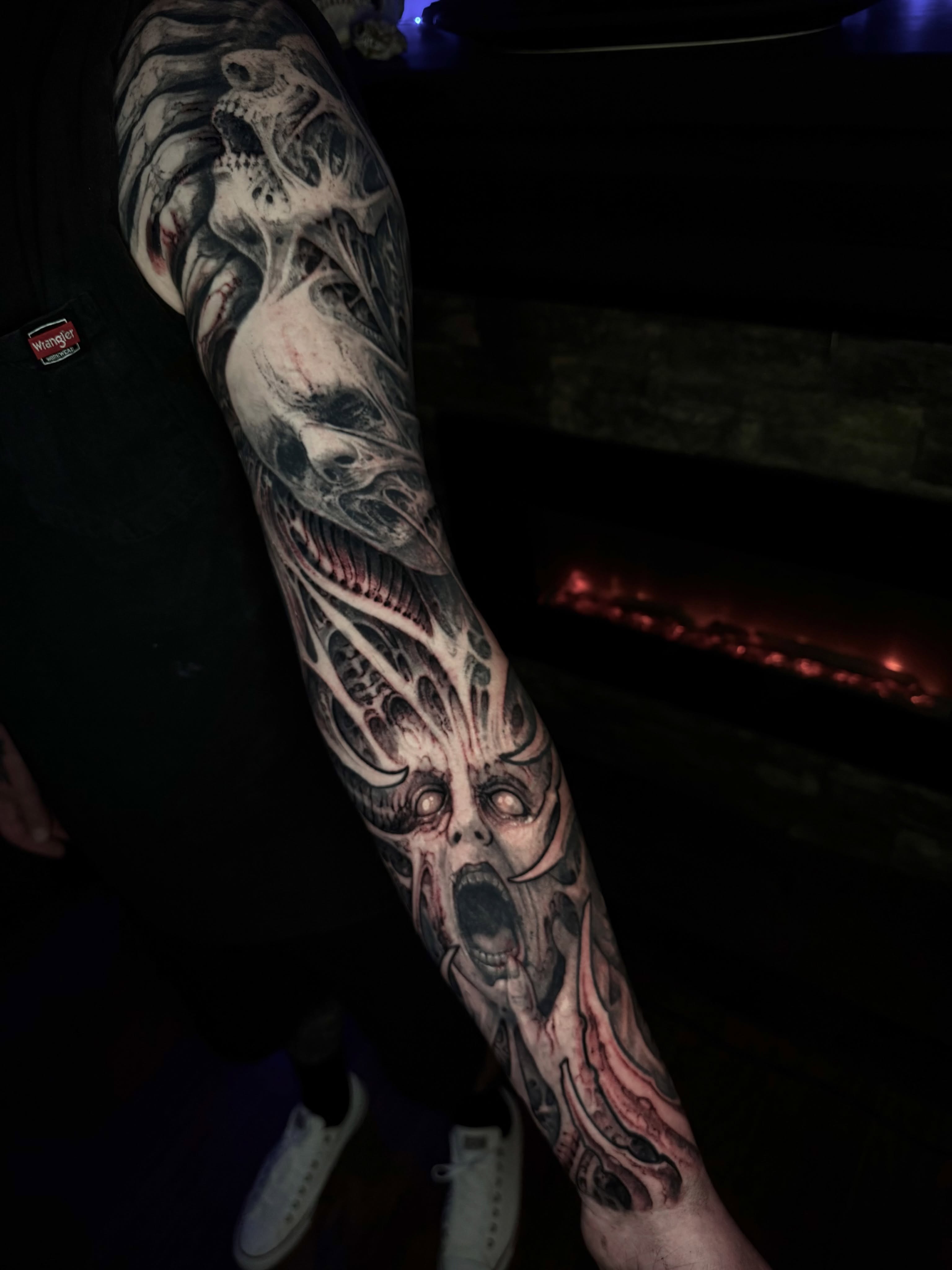 Horror creature dark realism tattoo on the forearm by Jeremiah Barba