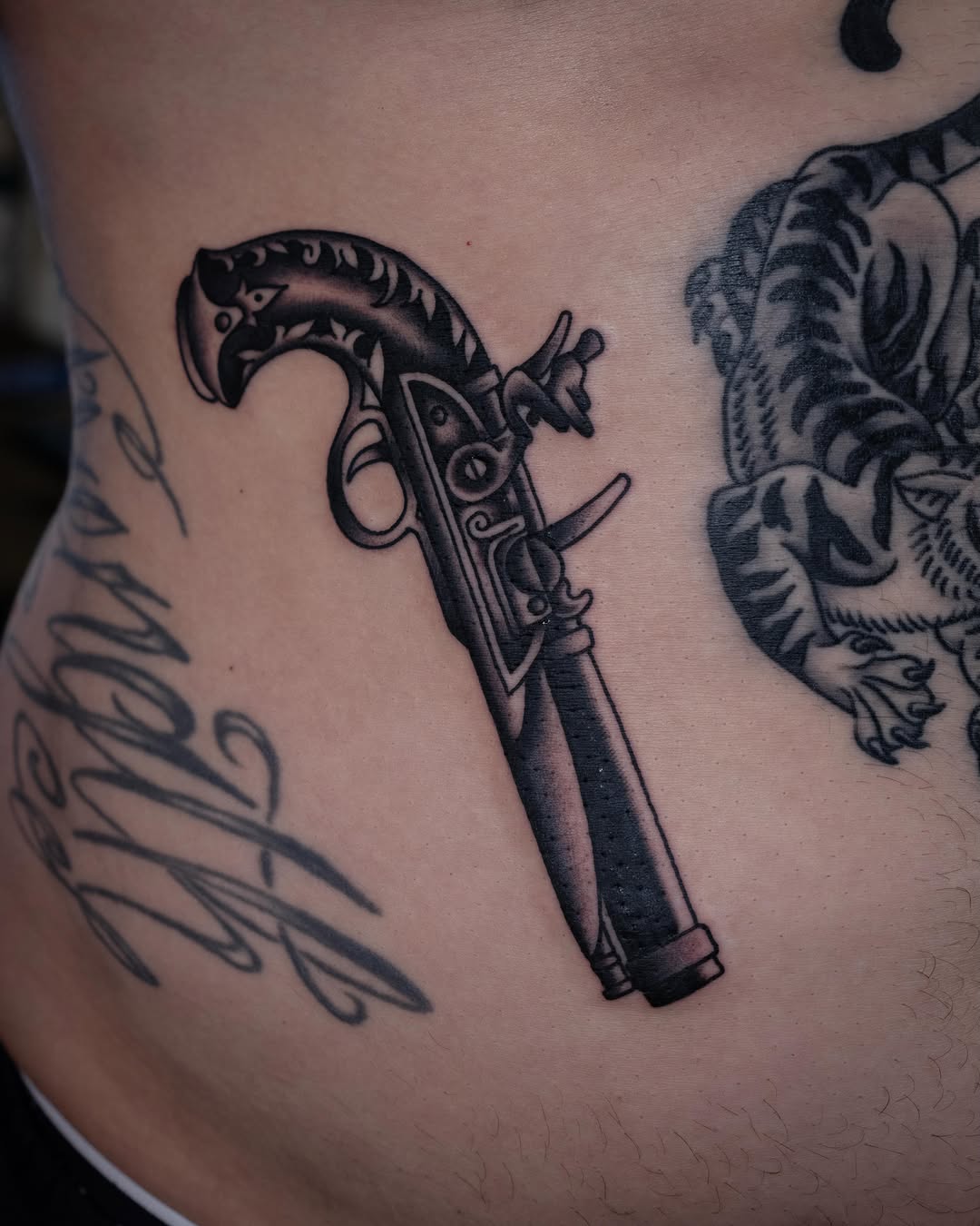 Tattoo by @justinrakowskitattoo — black_and_grey, realism