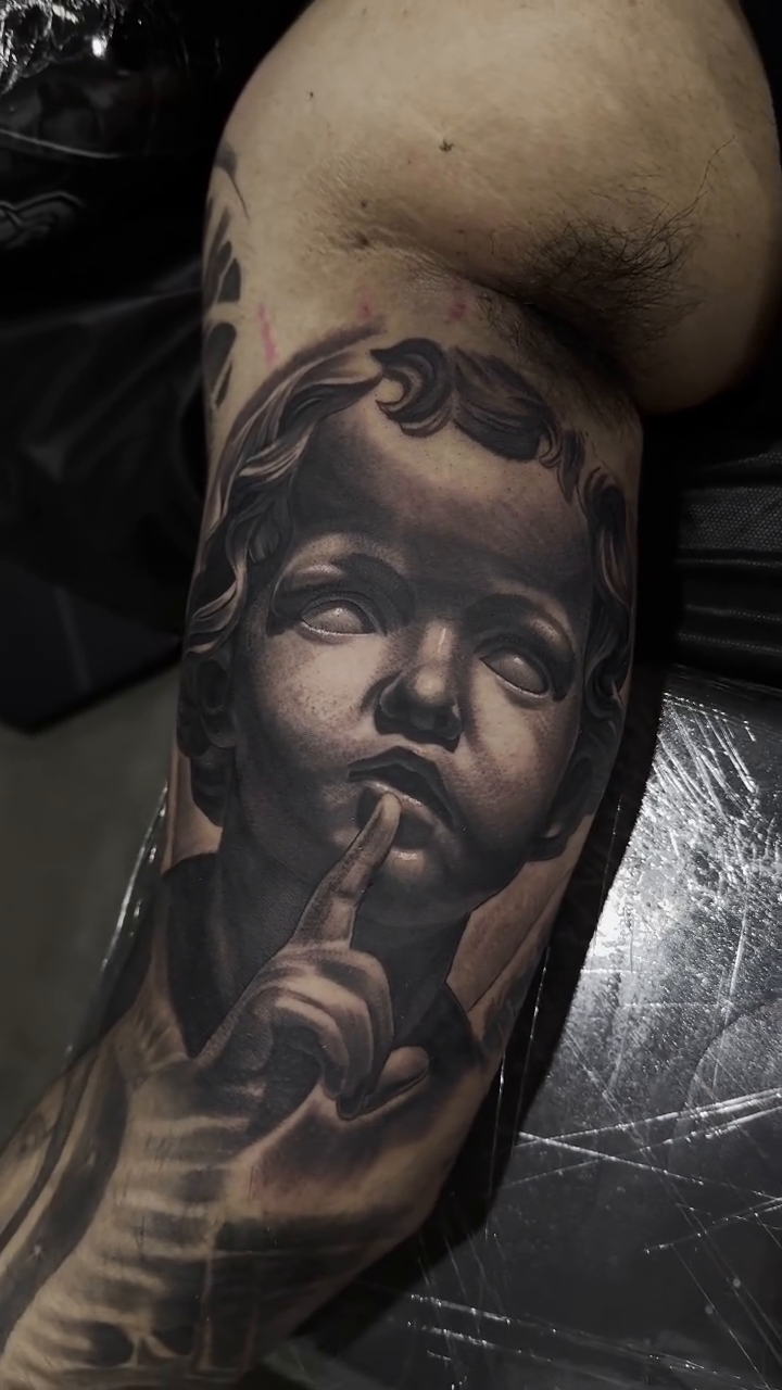 Tattoo by @tattoo_isaac562 — realism, black_and_grey