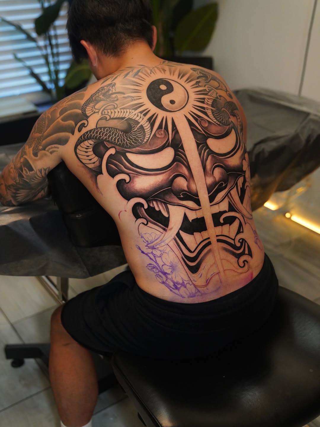Japanese tattoo on the back by Artem Kunakuzin