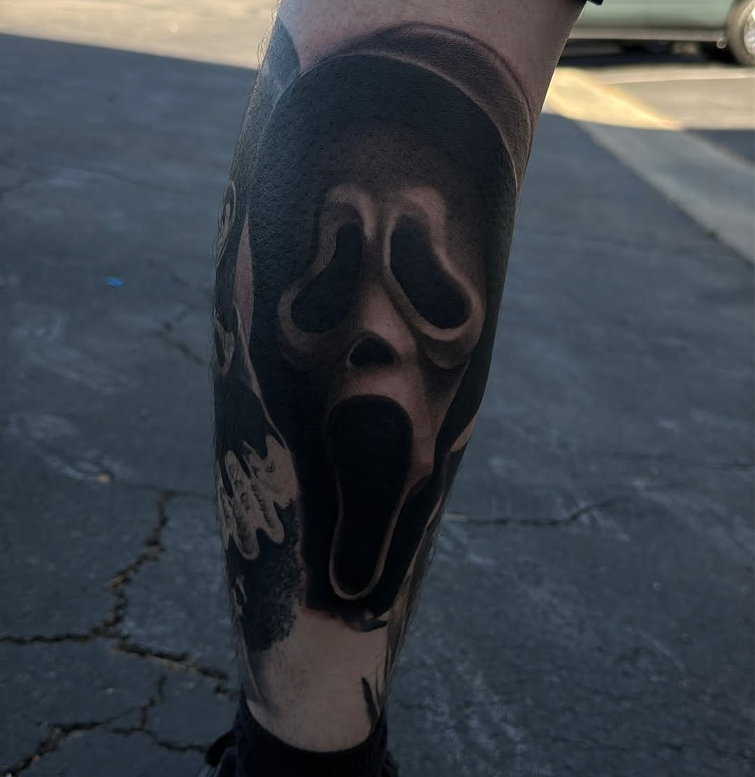 Ghostface mask realism tattoo on the forearm by Nick Campbell