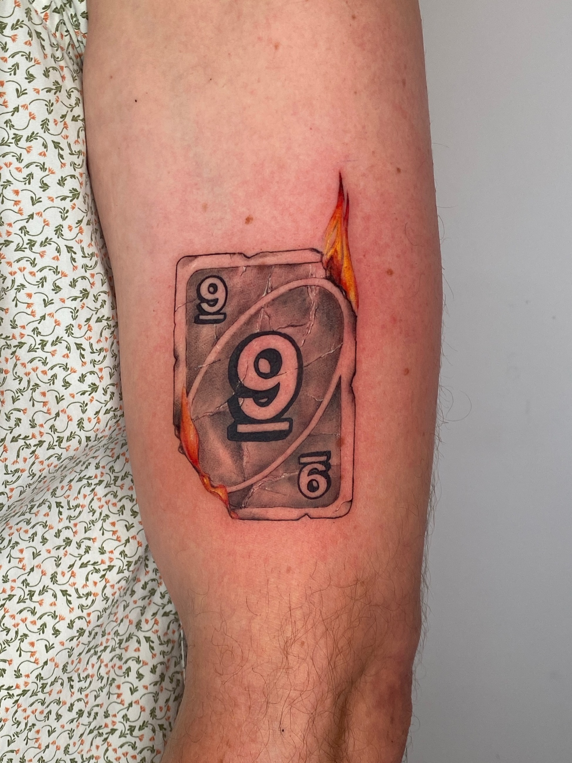 Number nine realism tattoo on the forearm by Milk Tattoos 🇸🇻🇪🇸